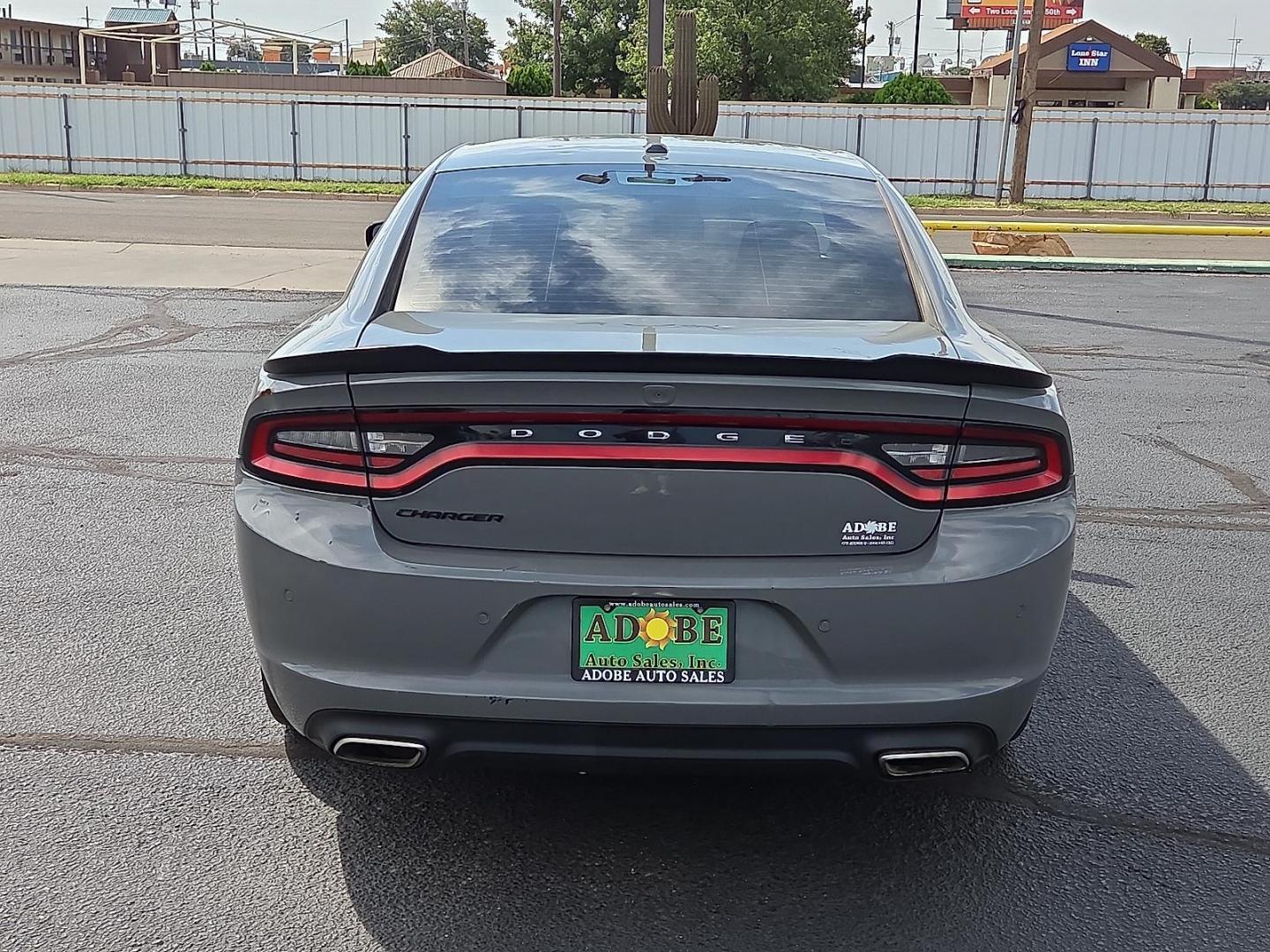 2018 Destroyer Gray Clearcoat - PDN /Black - X9 Dodge Charger SXT RWD (2C3CDXBG3JH) with an Pentastar 3.6L V-6 DOHC, variable valve control, regular unleaded, engine with 292HP engine, located at 4711 Ave Q, Lubbock, TX, 79412, (806) 687-2362, 33.551304, -101.855293 - Photo#3