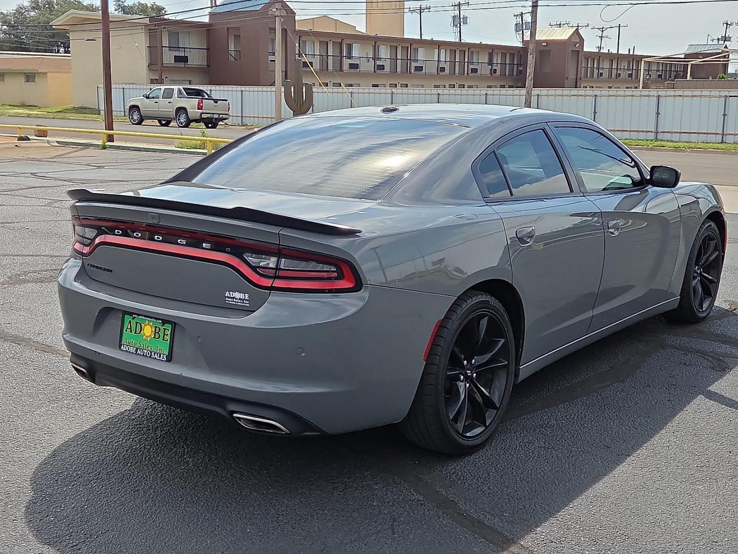 2018 Destroyer Gray Clearcoat - PDN /Black - X9 Dodge Charger SXT RWD (2C3CDXBG3JH) with an Pentastar 3.6L V-6 DOHC, variable valve control, regular unleaded, engine with 292HP engine, located at 4711 Ave Q, Lubbock, TX, 79412, (806) 687-2362, 33.551304, -101.855293 - Photo#4