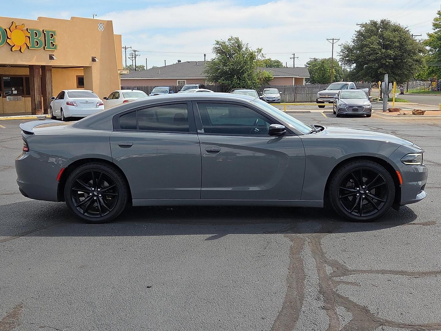 2018 Destroyer Gray Clearcoat - PDN /Black - X9 Dodge Charger SXT RWD (2C3CDXBG3JH) with an Pentastar 3.6L V-6 DOHC, variable valve control, regular unleaded, engine with 292HP engine, located at 4711 Ave Q, Lubbock, TX, 79412, (806) 687-2362, 33.551304, -101.855293 - Photo#5