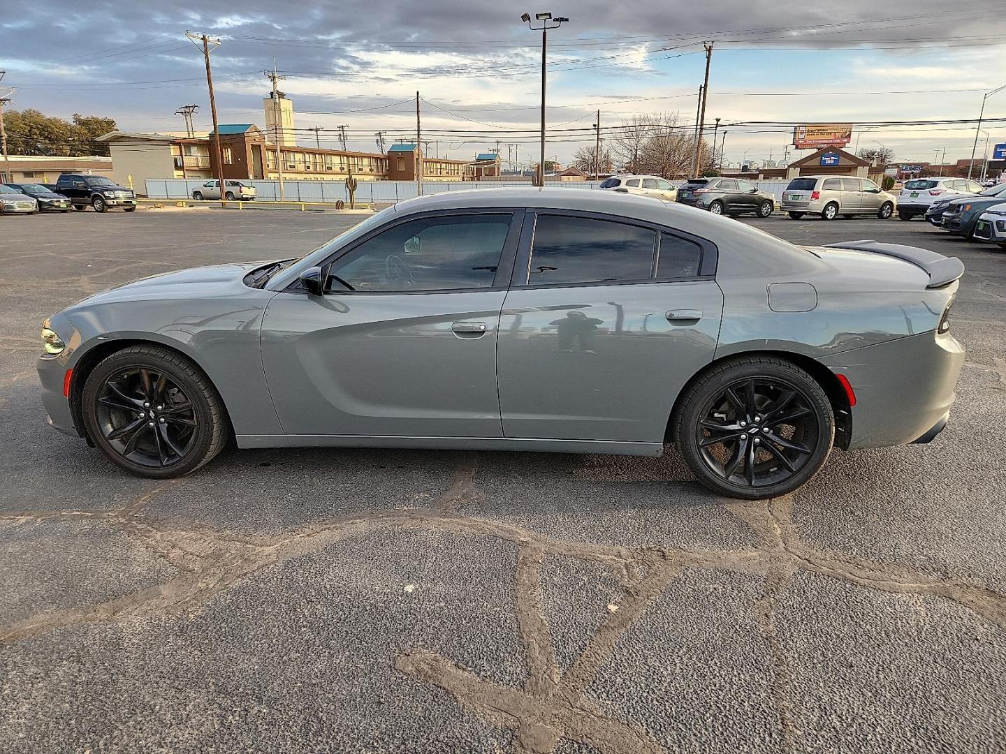 2018 GRAY Dodge Charger SXT RWD (2C3CDXBG3JH) with an Pentastar 3.6L V-6 DOHC, variable valve control, regular unleaded, engine with 292HP engine, located at 4711 Ave Q, Lubbock, TX, 79412, (806) 687-2362, 33.551304, -101.855293 - Photo#1