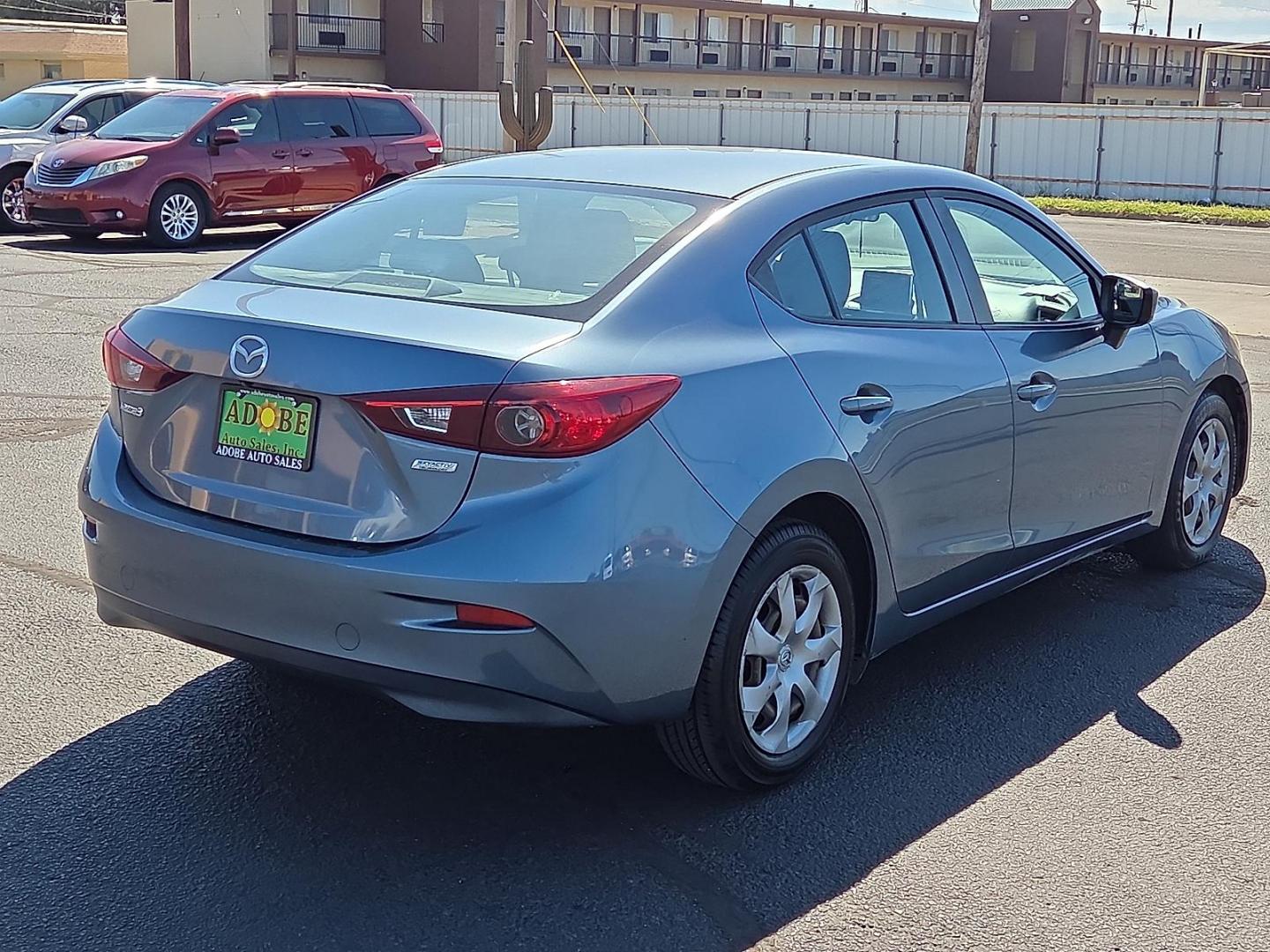 2016 Blue Reflex Mica - 42B /Black - BV0 Mazda Mazda3 i Sport (JM1BM1T77G1) with an SKYACTIV-G 2L I-4 gasoline direct injection, DOHC, variable valve control, regular unleaded, engine with 155HP engine, located at 4711 Ave Q, Lubbock, TX, 79412, (806) 687-2362, 33.551304, -101.855293 - Photo#4
