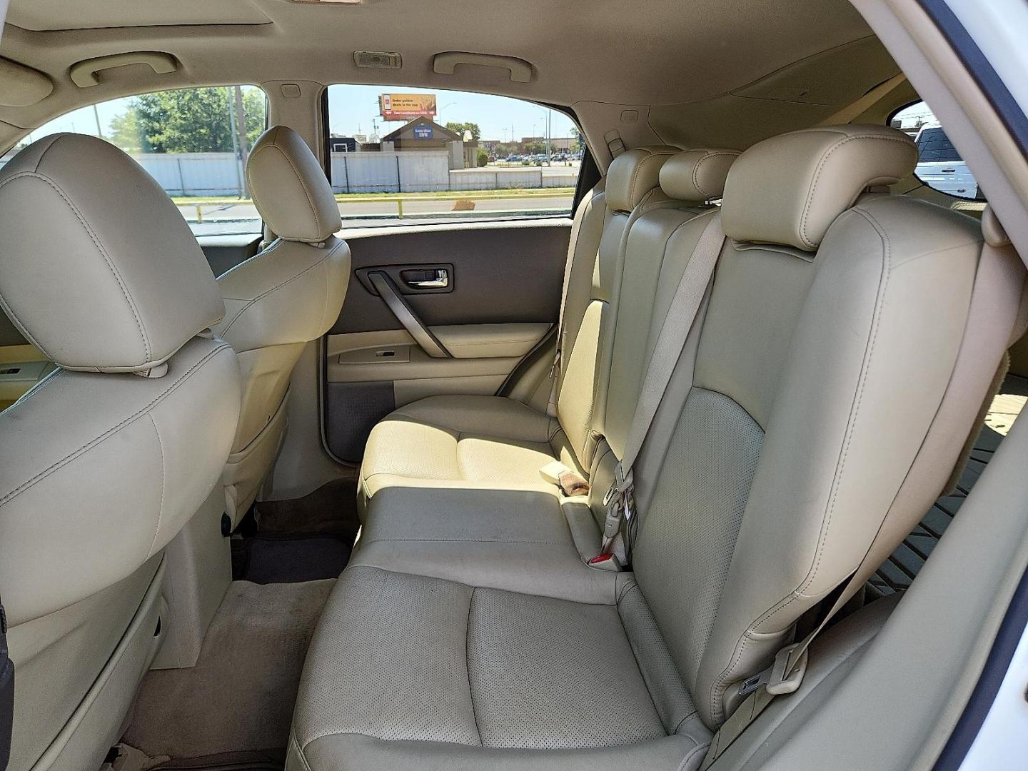 2006 WHITE INFINITI FX35 (JNRAS08U56X) with an VQ 3.5L V-6 DOHC, variable valve control, premium unleaded, engine with 280HP engine, located at 4711 Ave Q, Lubbock, TX, 79412, (806) 687-2362, 33.551304, -101.855293 - Photo#9