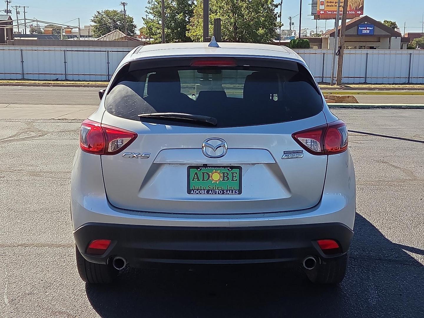 2016 Sonic Silver Metallic - 45P /Black - KC3 Mazda CX-5 Touring (JM3KE2CY3G0) with an SKYACTIV-G 2.5L I-4 gasoline direct injection, DOHC, variable valve control, regular unleaded, engine with 184HP engine, located at 4711 Ave Q, Lubbock, TX, 79412, (806) 687-2362, 33.551304, -101.855293 - Photo#3