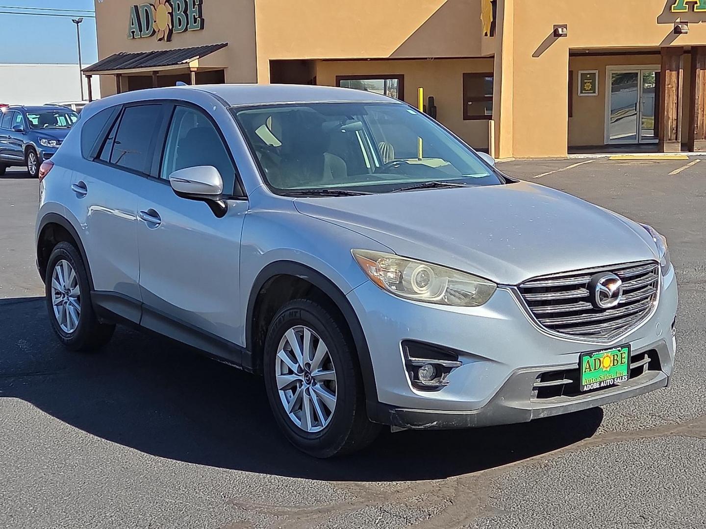 2016 Sonic Silver Metallic - 45P /Black - KC3 Mazda CX-5 Touring (JM3KE2CY3G0) with an SKYACTIV-G 2.5L I-4 gasoline direct injection, DOHC, variable valve control, regular unleaded, engine with 184HP engine, located at 4711 Ave Q, Lubbock, TX, 79412, (806) 687-2362, 33.551304, -101.855293 - Photo#6