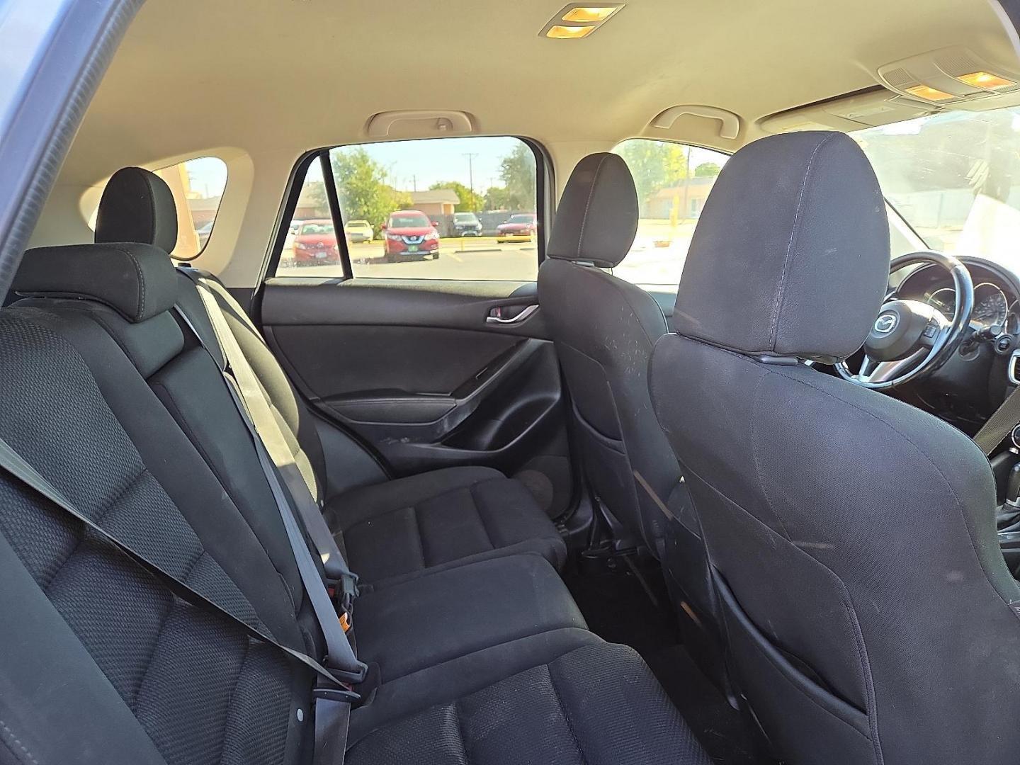 2016 Sonic Silver Metallic - 45P /Black - KC3 Mazda CX-5 Touring (JM3KE2CY3G0) with an SKYACTIV-G 2.5L I-4 gasoline direct injection, DOHC, variable valve control, regular unleaded, engine with 184HP engine, located at 4711 Ave Q, Lubbock, TX, 79412, (806) 687-2362, 33.551304, -101.855293 - Photo#13