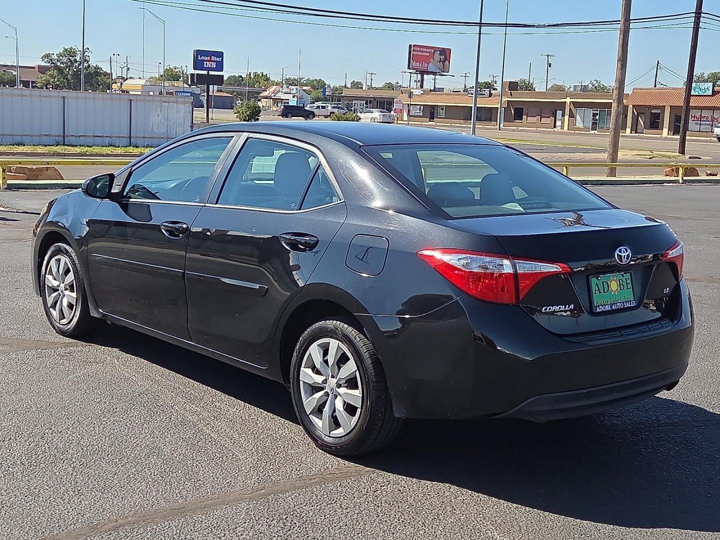 2015 Black Sand Mica - 209 /Ash - 16 Toyota Corolla LE (2T1BURHE7FC) with an 1.8L I-4 DOHC, VVT-i variable valve control, regular unleaded, engine with 132HP engine, located at 4711 Ave Q, Lubbock, TX, 79412, (806) 687-2362, 33.551304, -101.855293 - Photo#2