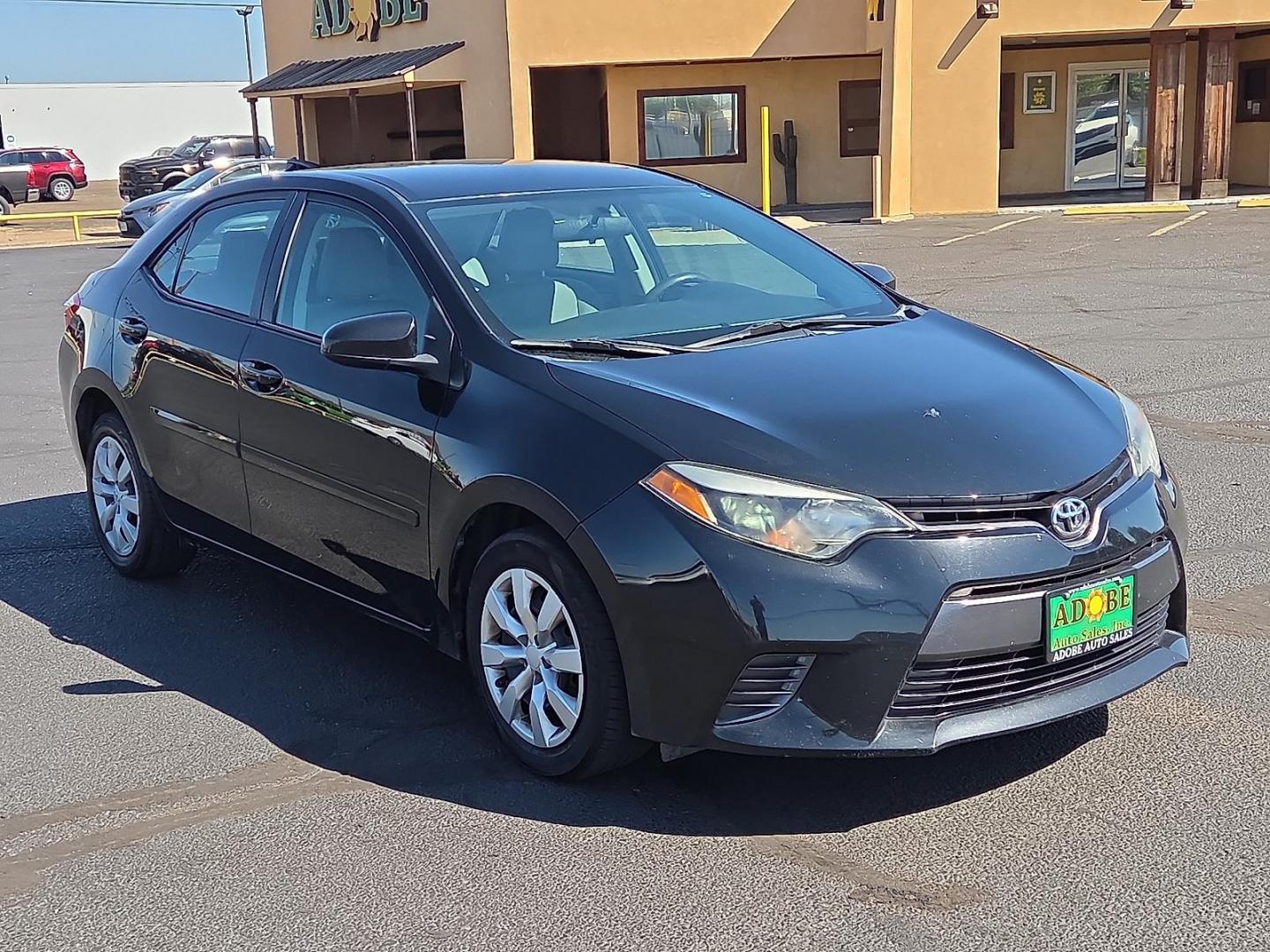 2015 Black Sand Mica - 209 /Ash - 16 Toyota Corolla LE (2T1BURHE7FC) with an 1.8L I-4 DOHC, VVT-i variable valve control, regular unleaded, engine with 132HP engine, located at 4711 Ave Q, Lubbock, TX, 79412, (806) 687-2362, 33.551304, -101.855293 - Photo#6