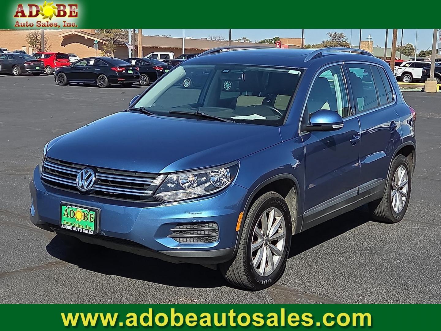 2017 Pacific Blue Metallic - D5D5 /Cornsilk Beige - NT Volkswagen Tiguan 2.0T Wolfsburg Edition (WVGSV7AX8HK) with an 2L I-4 gasoline direct injection, DOHC, variable valve control, intercooled turbo, premium unleaded, engine with 200HP engine, located at 4711 Ave Q, Lubbock, TX, 79412, (806) 687-2362, 33.551304, -101.855293 - Photo#0