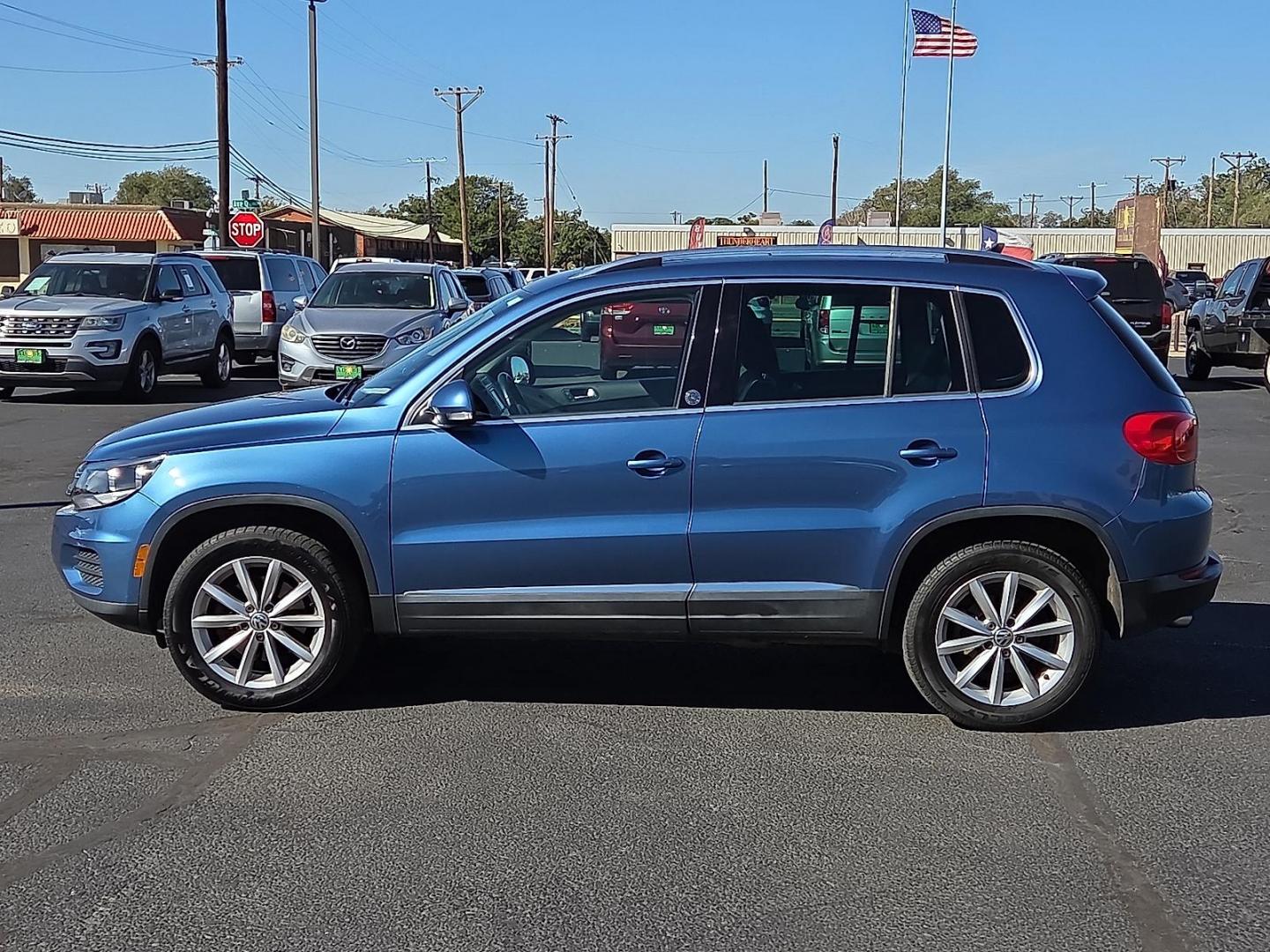 2017 Pacific Blue Metallic - D5D5 /Cornsilk Beige - NT Volkswagen Tiguan 2.0T Wolfsburg Edition (WVGSV7AX8HK) with an 2L I-4 gasoline direct injection, DOHC, variable valve control, intercooled turbo, premium unleaded, engine with 200HP engine, located at 4711 Ave Q, Lubbock, TX, 79412, (806) 687-2362, 33.551304, -101.855293 - Photo#1