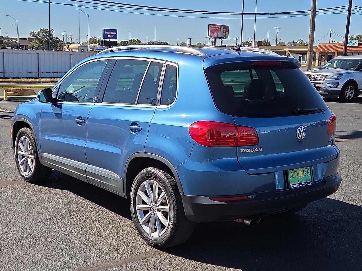 2017 Pacific Blue Metallic - D5D5 /Cornsilk Beige - NT Volkswagen Tiguan 2.0T Wolfsburg Edition (WVGSV7AX8HK) with an 2L I-4 gasoline direct injection, DOHC, variable valve control, intercooled turbo, premium unleaded, engine with 200HP engine, located at 4711 Ave Q, Lubbock, TX, 79412, (806) 687-2362, 33.551304, -101.855293 - Photo#2
