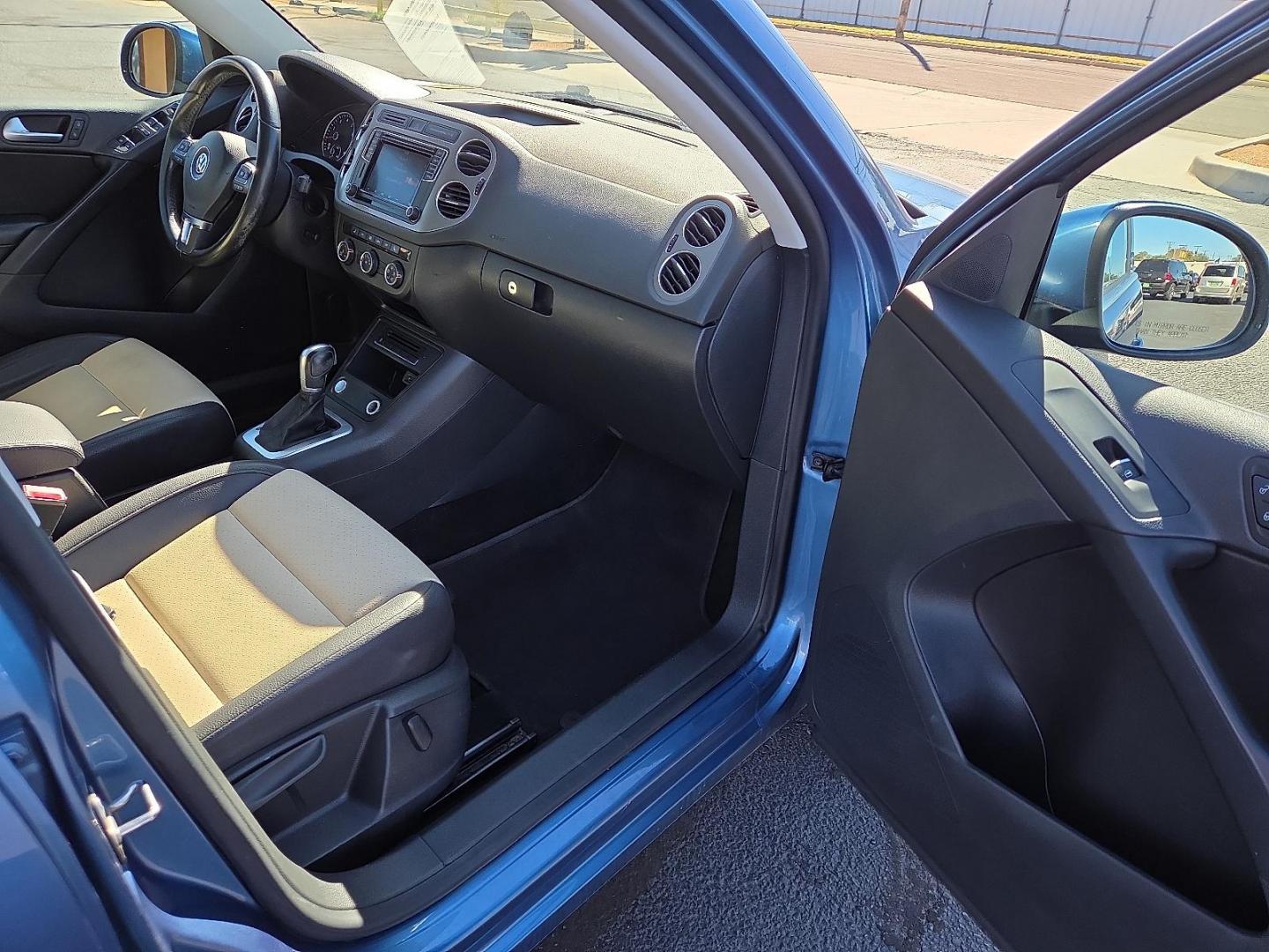 2017 Pacific Blue Metallic - D5D5 /Cornsilk Beige - NT Volkswagen Tiguan 2.0T Wolfsburg Edition (WVGSV7AX8HK) with an 2L I-4 gasoline direct injection, DOHC, variable valve control, intercooled turbo, premium unleaded, engine with 200HP engine, located at 4711 Ave Q, Lubbock, TX, 79412, (806) 687-2362, 33.551304, -101.855293 - Photo#12