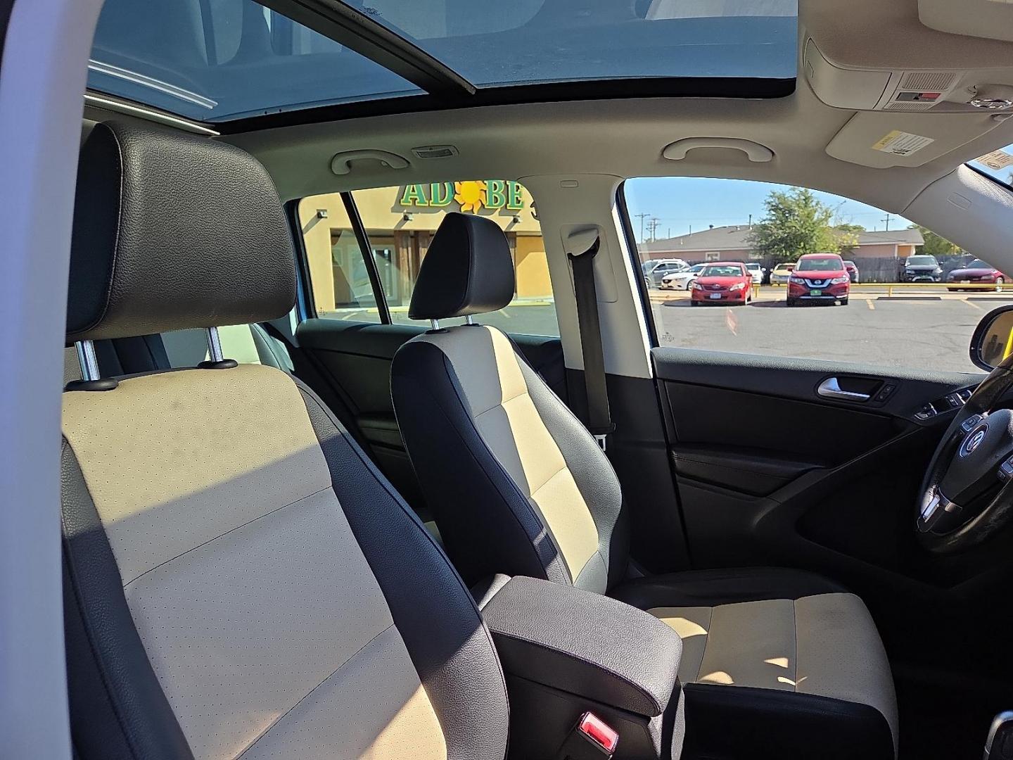 2017 Pacific Blue Metallic - D5D5 /Cornsilk Beige - NT Volkswagen Tiguan 2.0T Wolfsburg Edition (WVGSV7AX8HK) with an 2L I-4 gasoline direct injection, DOHC, variable valve control, intercooled turbo, premium unleaded, engine with 200HP engine, located at 4711 Ave Q, Lubbock, TX, 79412, (806) 687-2362, 33.551304, -101.855293 - Photo#14