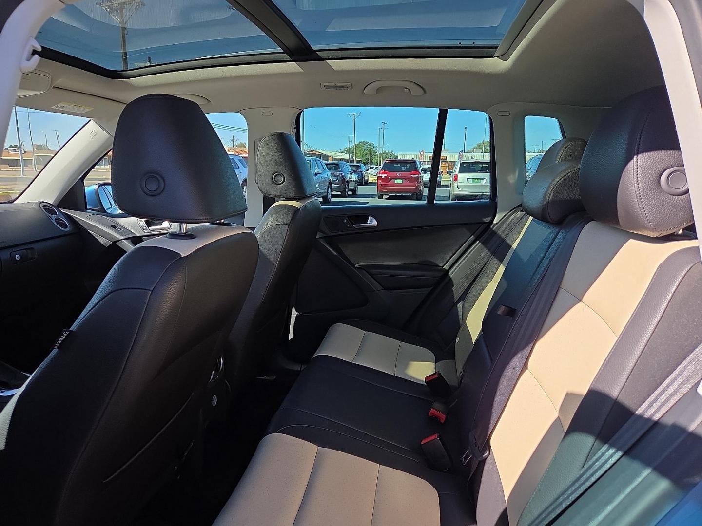 2017 Pacific Blue Metallic - D5D5 /Cornsilk Beige - NT Volkswagen Tiguan 2.0T Wolfsburg Edition (WVGSV7AX8HK) with an 2L I-4 gasoline direct injection, DOHC, variable valve control, intercooled turbo, premium unleaded, engine with 200HP engine, located at 4711 Ave Q, Lubbock, TX, 79412, (806) 687-2362, 33.551304, -101.855293 - Photo#18