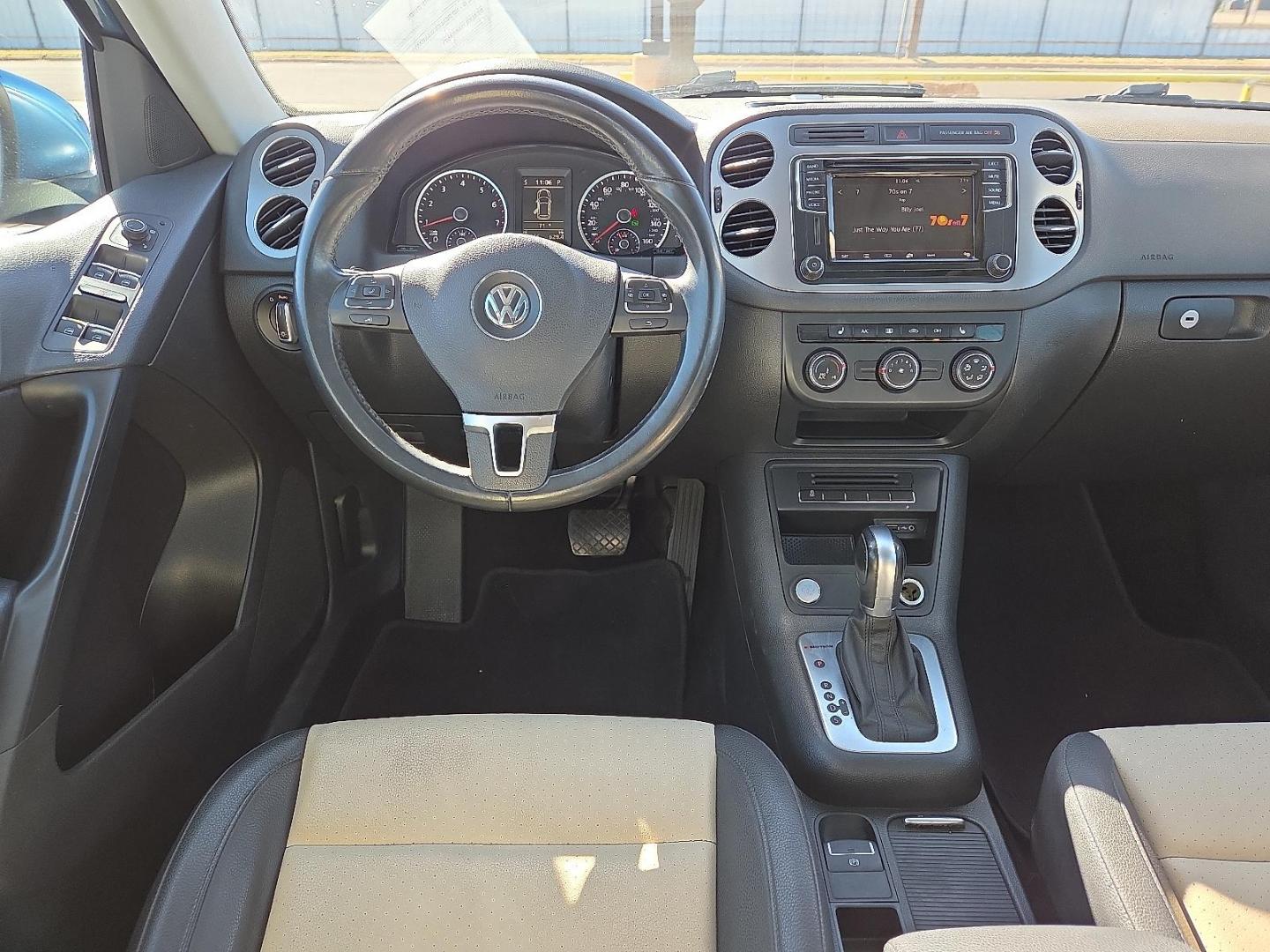 2017 Pacific Blue Metallic - D5D5 /Cornsilk Beige - NT Volkswagen Tiguan 2.0T Wolfsburg Edition (WVGSV7AX8HK) with an 2L I-4 gasoline direct injection, DOHC, variable valve control, intercooled turbo, premium unleaded, engine with 200HP engine, located at 4711 Ave Q, Lubbock, TX, 79412, (806) 687-2362, 33.551304, -101.855293 - Photo#19