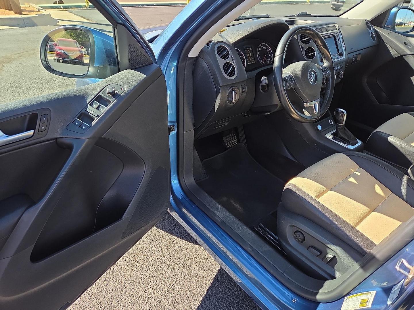 2017 Pacific Blue Metallic - D5D5 /Cornsilk Beige - NT Volkswagen Tiguan 2.0T Wolfsburg Edition (WVGSV7AX8HK) with an 2L I-4 gasoline direct injection, DOHC, variable valve control, intercooled turbo, premium unleaded, engine with 200HP engine, located at 4711 Ave Q, Lubbock, TX, 79412, (806) 687-2362, 33.551304, -101.855293 - Photo#21