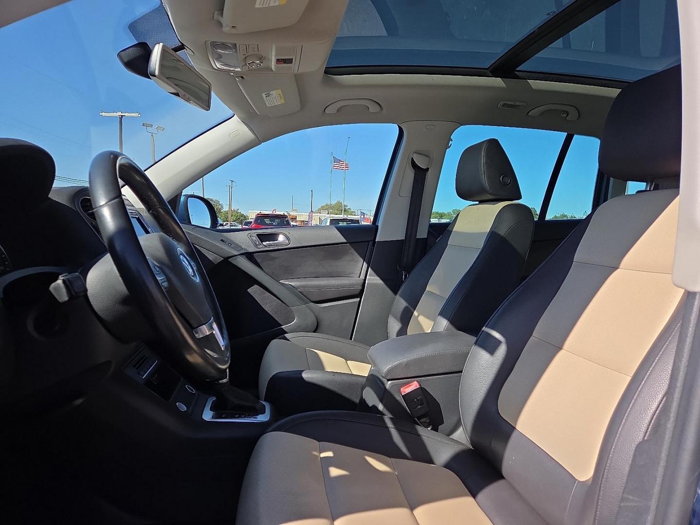 2017 Pacific Blue Metallic - D5D5 /Cornsilk Beige - NT Volkswagen Tiguan 2.0T Wolfsburg Edition (WVGSV7AX8HK) with an 2L I-4 gasoline direct injection, DOHC, variable valve control, intercooled turbo, premium unleaded, engine with 200HP engine, located at 4711 Ave Q, Lubbock, TX, 79412, (806) 687-2362, 33.551304, -101.855293 - Photo#24