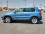 2017 BLUE /Cornsilk Beige - NT Volkswagen Tiguan 2.0T Wolfsburg Edition (WVGSV7AX8HK) with an 2L I-4 gasoline direct injection, DOHC, variable valve control, intercooled turbo, premium unleaded, engine with 200HP engine, located at 4711 Ave Q, Lubbock, TX, 79412, (806) 687-2362, 33.551304, -101.855293- Photo#1