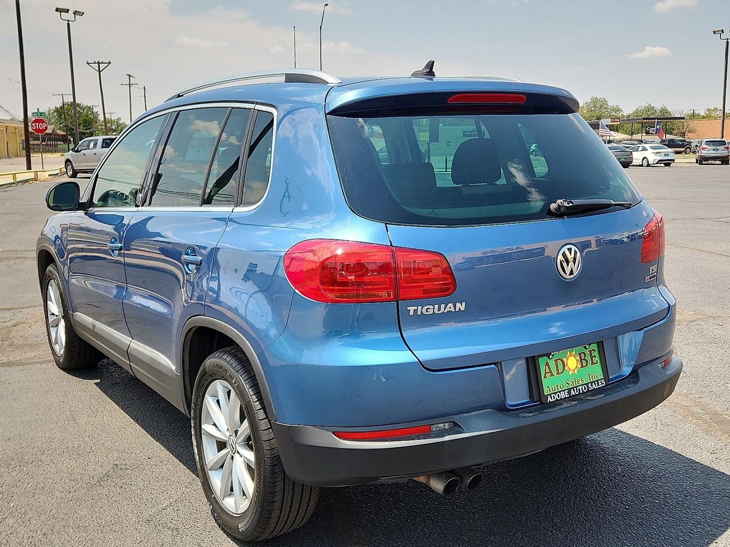 2017 BLUE /Cornsilk Beige - NT Volkswagen Tiguan 2.0T Wolfsburg Edition (WVGSV7AX8HK) with an 2L I-4 gasoline direct injection, DOHC, variable valve control, intercooled turbo, premium unleaded, engine with 200HP engine, located at 4711 Ave Q, Lubbock, TX, 79412, (806) 687-2362, 33.551304, -101.855293- Photo#2