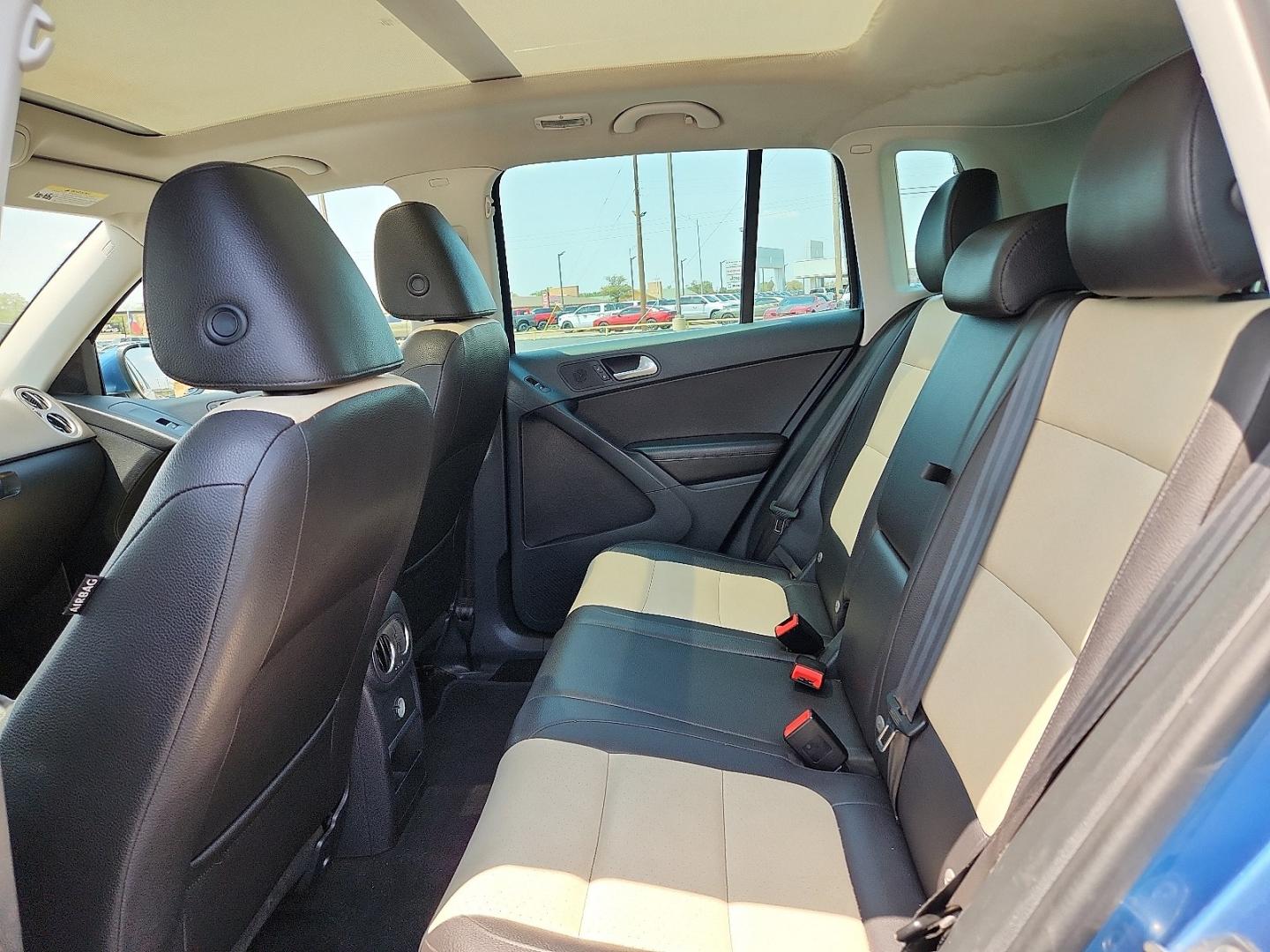 2017 BLUE /Cornsilk Beige - NT Volkswagen Tiguan 2.0T Wolfsburg Edition (WVGSV7AX8HK) with an 2L I-4 gasoline direct injection, DOHC, variable valve control, intercooled turbo, premium unleaded, engine with 200HP engine, located at 4711 Ave Q, Lubbock, TX, 79412, (806) 687-2362, 33.551304, -101.855293- Photo#14