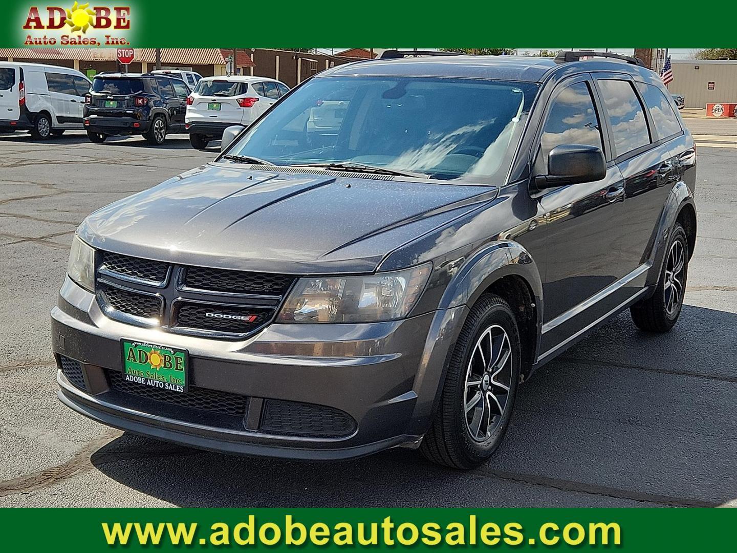 2018 GRAY Dodge Journey SE (3C4PDCAB0JT) with an Tigershark MultiAir 2.4L I-4 DOHC, variable valve control, regular unleaded, engine with 173HP engine, located at 4711 Ave Q, Lubbock, TX, 79412, (806) 687-2362, 33.551304, -101.855293 - Photo#0