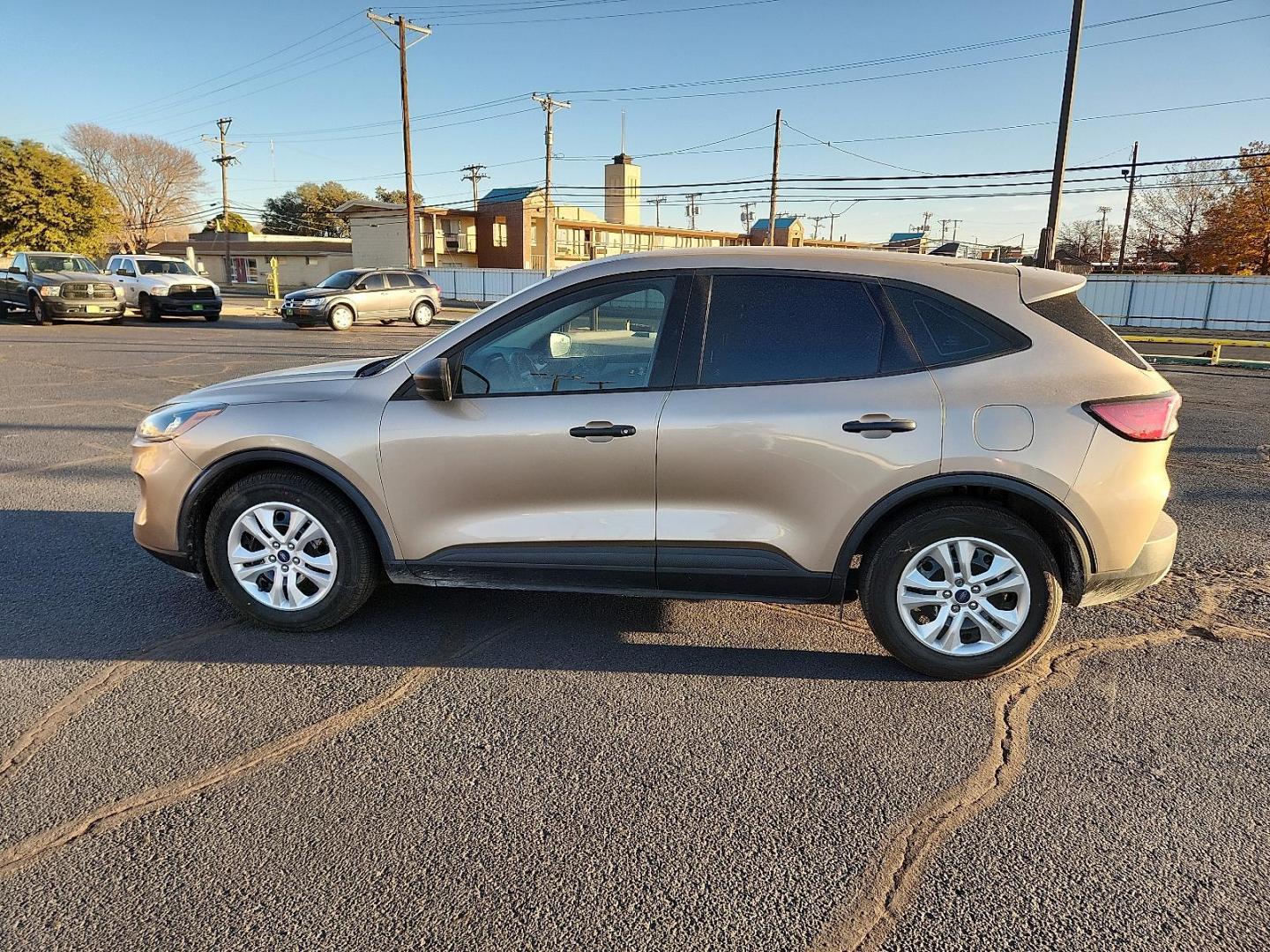 2020 GOLD Ford Escape S (1FMCU0F6XLU) with an EcoBoost 1.5L I-3 port/direct injection, DOHC, Ti-VCT variable valve control, intercooled turbo, premium unleaded, engine with 181HP engine, located at 4711 Ave Q, Lubbock, TX, 79412, (806) 687-2362, 33.551304, -101.855293 - Photo#1