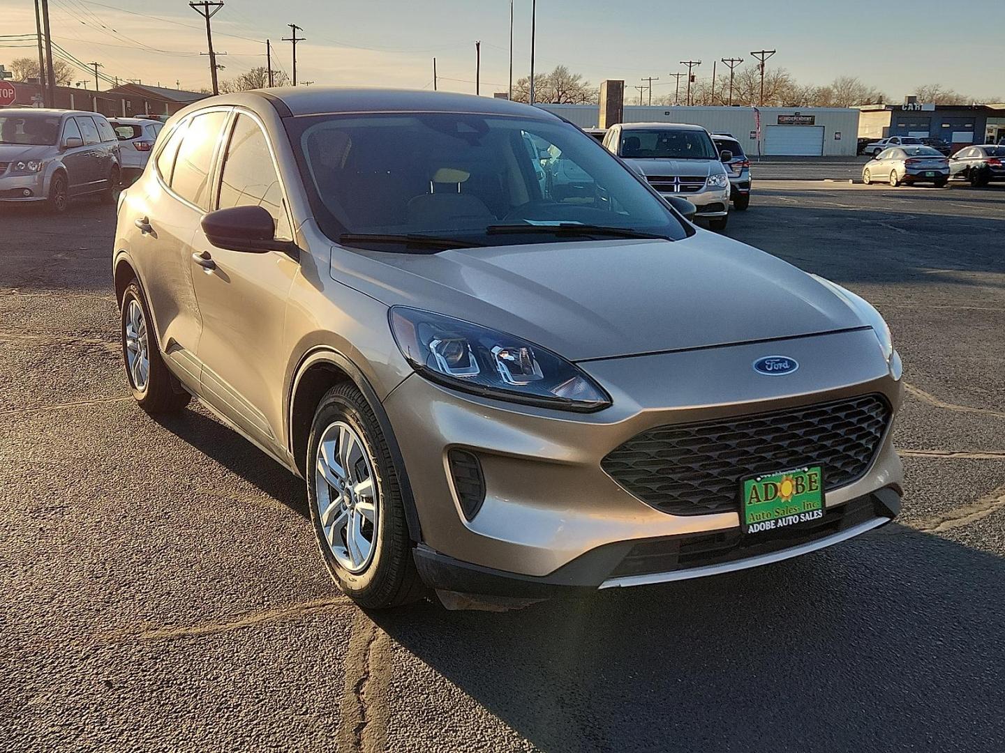 2020 GOLD Ford Escape S (1FMCU0F6XLU) with an EcoBoost 1.5L I-3 port/direct injection, DOHC, Ti-VCT variable valve control, intercooled turbo, premium unleaded, engine with 181HP engine, located at 4711 Ave Q, Lubbock, TX, 79412, (806) 687-2362, 33.551304, -101.855293 - Photo#5