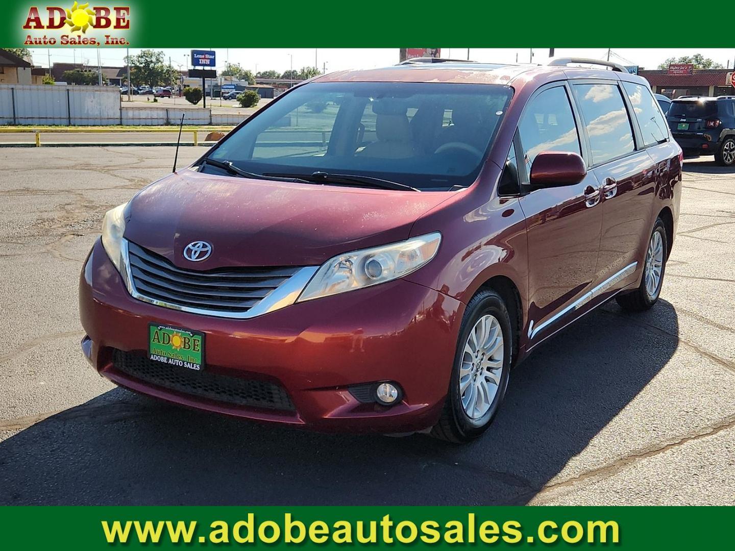 2013 MAROON Toyota Sienna XLE V6 8 Passenger (5TDYK3DC0DS) with an 3.5L V-6 DOHC, variable valve control, regular unleaded, engine with 266HP engine, located at 4711 Ave Q, Lubbock, TX, 79412, (806) 687-2362, 33.551304, -101.855293 - Photo#0