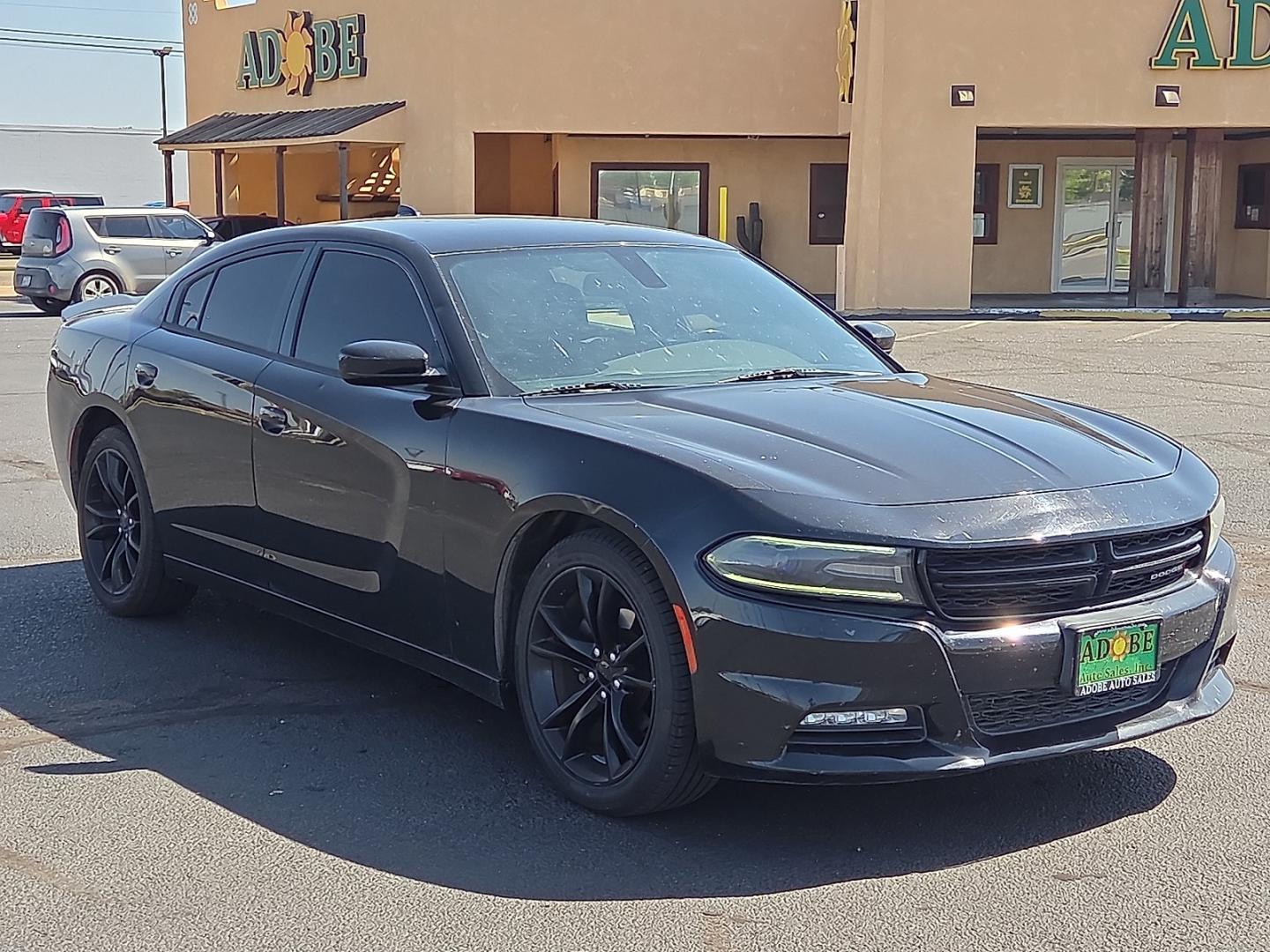 2016 Pitch Black Clearcoat - PX8 /Black - X9 Dodge Charger SXT (2C3CDXHG1GH) with an Pentastar 3.6L V-6 DOHC, variable valve control, regular unleaded, engine with 292HP engine, located at 4711 Ave Q, Lubbock, TX, 79412, (806) 687-2362, 33.551304, -101.855293- Photo#6