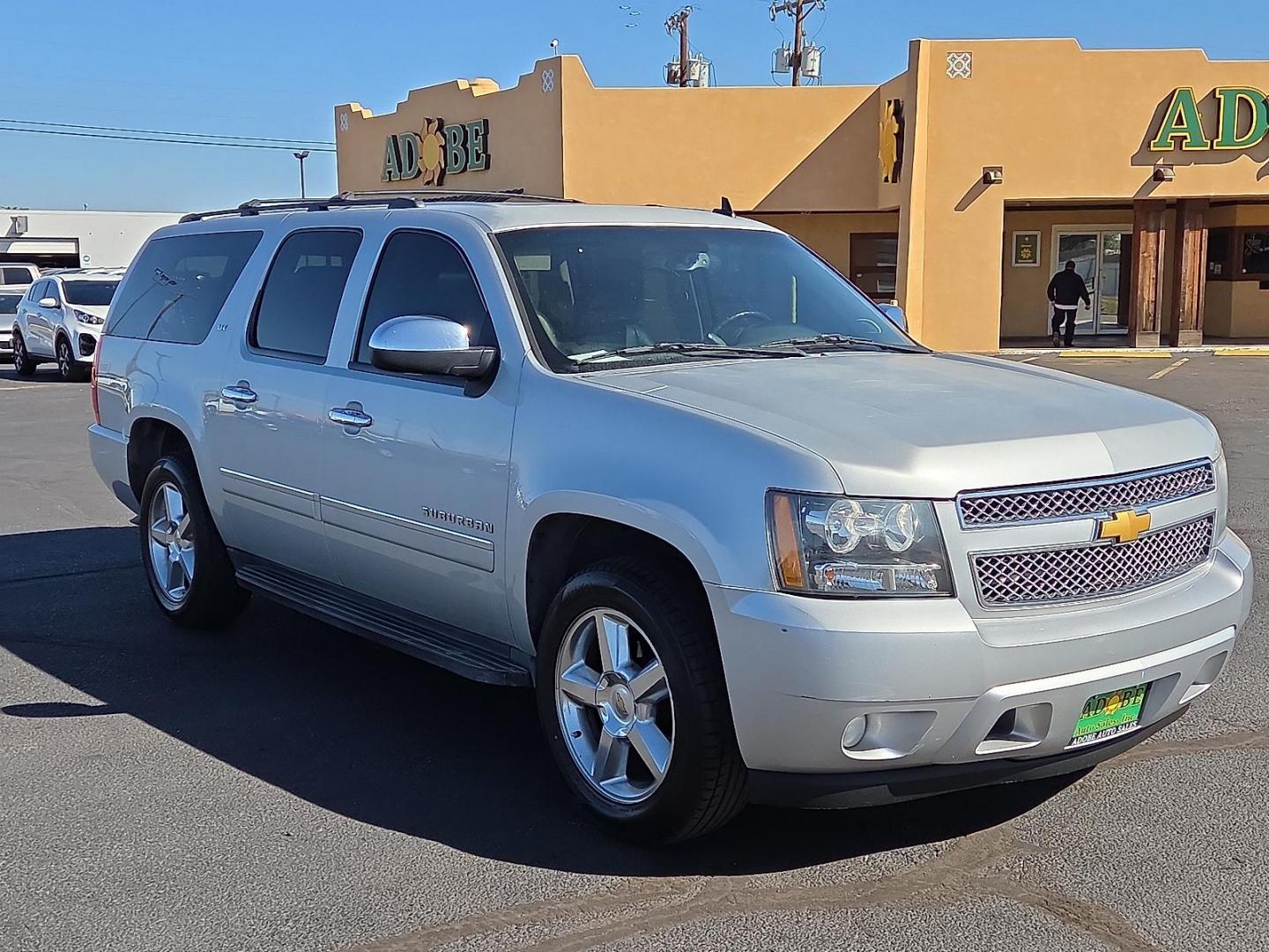 2014 Silver Ice Metallic - GAN /Ebony - 196 Chevrolet Suburban 1500 LTZ (1GNSCKE03ER) with an Vortec 5.3L V-8 variable valve control, regular unleaded, engine with cylinder deactivation and 320HP engine, located at 4711 Ave Q, Lubbock, TX, 79412, (806) 687-2362, 33.551304, -101.855293 - Photo#6