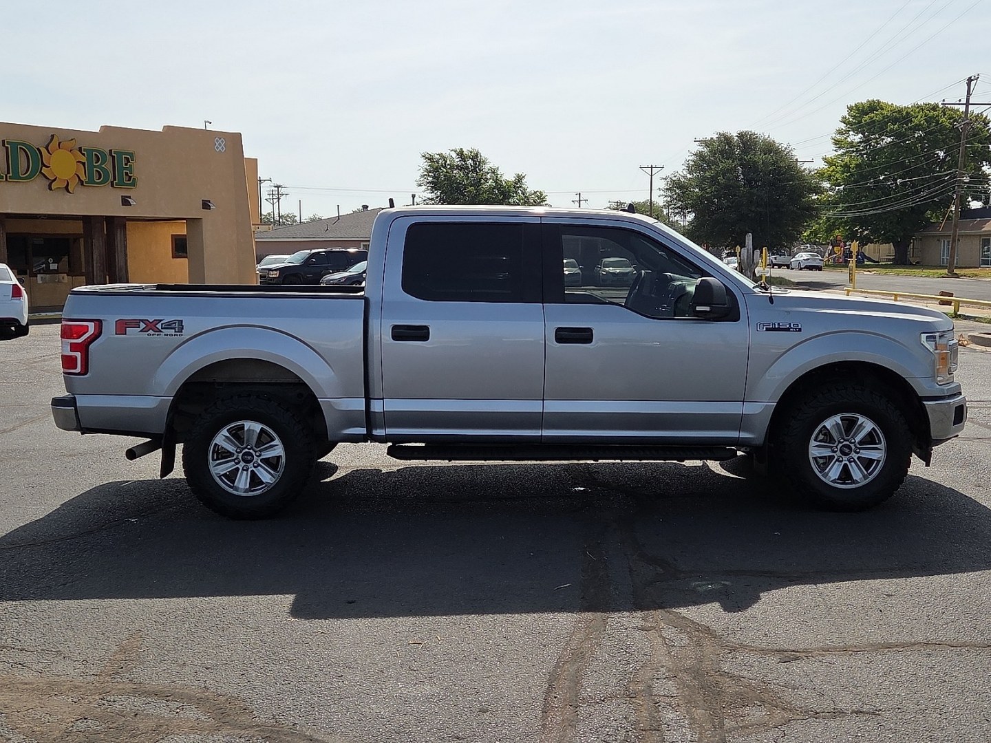 2020 Iconic Silver Metallic - JS /Medium Earth Gray - MG Ford F-150 XLT (1FTEW1E51LK) with an 5L V-8 port/direct injection, DOHC, variable valve control, regular unleaded, engine with 395HP engine, located at 4711 Ave Q, Lubbock, TX, 79412, (806) 687-2362, 33.551304, -101.855293- Photo#5