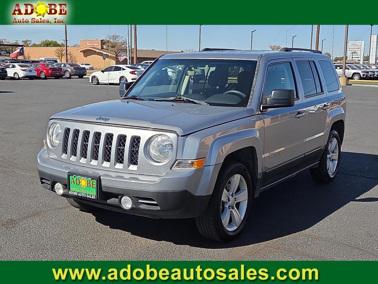 2017 Billet Silver Metallic Clearcoat - PSC /Dark Slate Gray - DV Jeep Patriot Latitude FWD (1C4NJPFA1HD) with an 2L I-4 DOHC, variable valve control, regular unleaded, engine with 158HP engine, located at 4711 Ave Q, Lubbock, TX, 79412, (806) 687-2362, 33.551304, -101.855293 - Photo#0