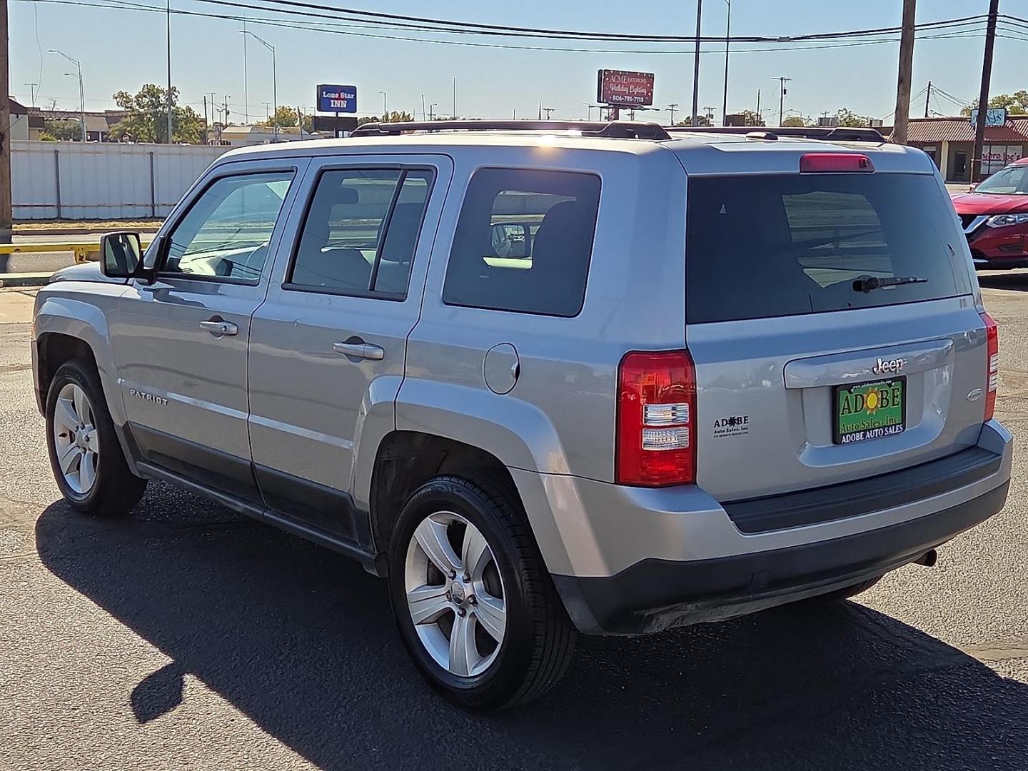 2017 Billet Silver Metallic Clearcoat - PSC /Dark Slate Gray - DV Jeep Patriot Latitude FWD (1C4NJPFA1HD) with an 2L I-4 DOHC, variable valve control, regular unleaded, engine with 158HP engine, located at 4711 Ave Q, Lubbock, TX, 79412, (806) 687-2362, 33.551304, -101.855293 - Photo#2