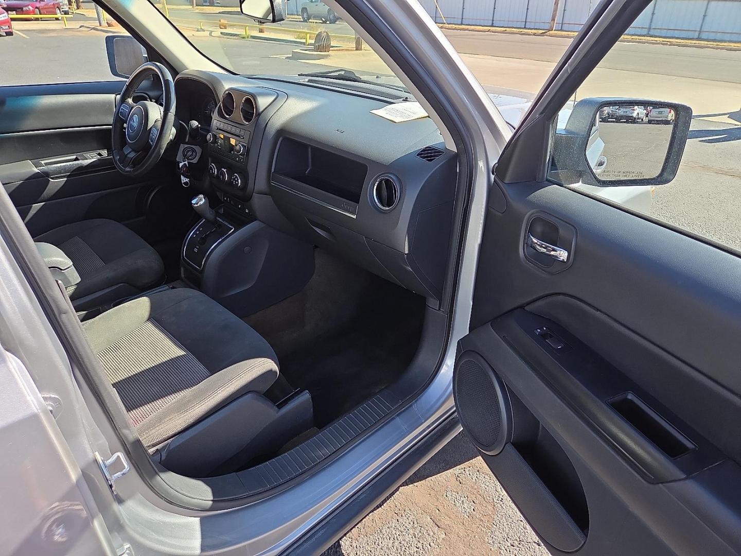 2017 Billet Silver Metallic Clearcoat - PSC /Dark Slate Gray - DV Jeep Patriot Latitude FWD (1C4NJPFA1HD) with an 2L I-4 DOHC, variable valve control, regular unleaded, engine with 158HP engine, located at 4711 Ave Q, Lubbock, TX, 79412, (806) 687-2362, 33.551304, -101.855293 - Photo#11