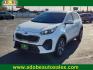 2021 WHITE Kia Sportage LX (KNDPM3AC5M7) with an Theta II 2.4L I-4 gasoline direct injection, DOHC, D-CVVT variable valve control, regular unleaded, engine with 181HP engine, located at 4711 Ave Q, Lubbock, TX, 79412, (806) 687-2362, 33.551304, -101.855293 - Photo#0