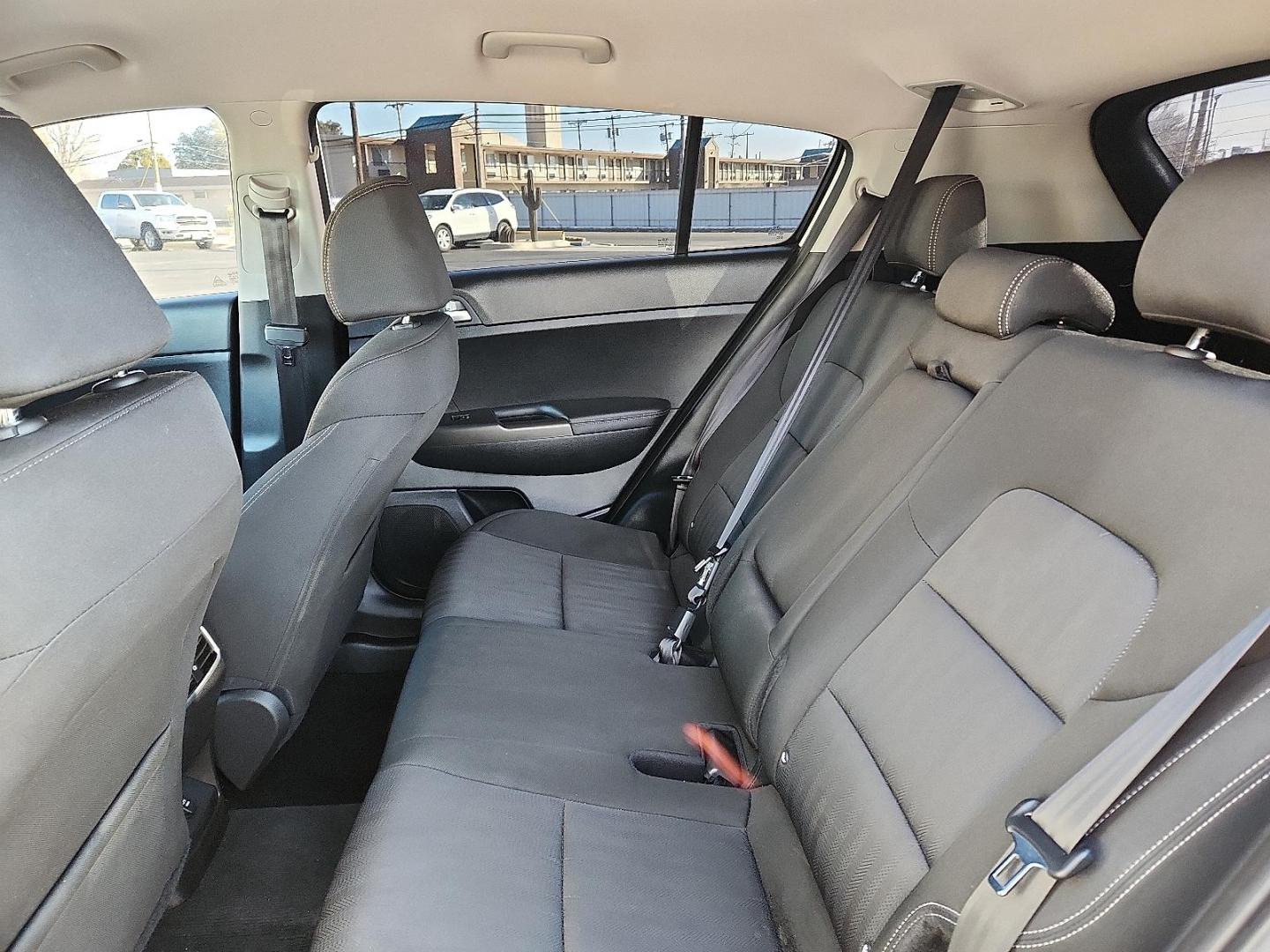 2021 WHITE Kia Sportage LX (KNDPM3AC5M7) with an Theta II 2.4L I-4 gasoline direct injection, DOHC, D-CVVT variable valve control, regular unleaded, engine with 181HP engine, located at 4711 Ave Q, Lubbock, TX, 79412, (806) 687-2362, 33.551304, -101.855293 - Photo#8