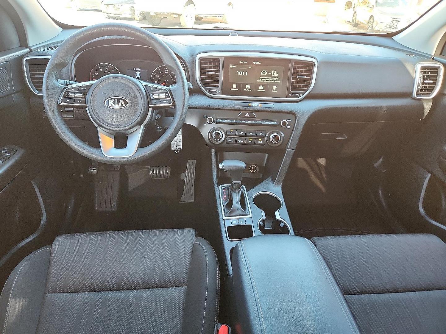 2021 WHITE Kia Sportage LX (KNDPM3AC5M7) with an Theta II 2.4L I-4 gasoline direct injection, DOHC, D-CVVT variable valve control, regular unleaded, engine with 181HP engine, located at 4711 Ave Q, Lubbock, TX, 79412, (806) 687-2362, 33.551304, -101.855293 - Photo#9