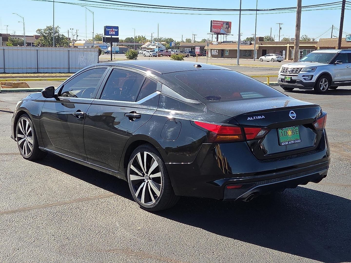 2019 Super Black - KH3 /Sport - N Nissan Altima 2.5 SR (1N4BL4CV2KC) with an 2.5L I-4 gasoline direct injection, DOHC, CVTCS variable valve control, regular unleaded, engine with 182HP engine, located at 4711 Ave Q, Lubbock, TX, 79412, (806) 687-2362, 33.551304, -101.855293 - Photo#2
