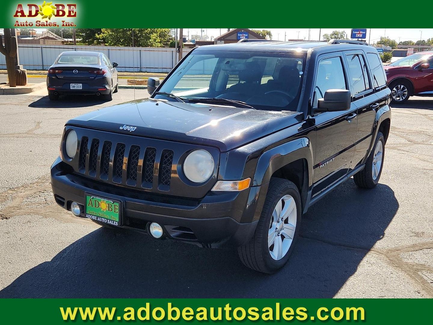 2012 BLACK Jeep Patriot Latitude (1C4NJPFB6CD) with an 2.4L I-4 DOHC, variable valve control, regular unleaded, engine with 172HP engine, located at 4711 Ave Q, Lubbock, TX, 79412, (806) 687-2362, 33.551304, -101.855293 - Photo#0