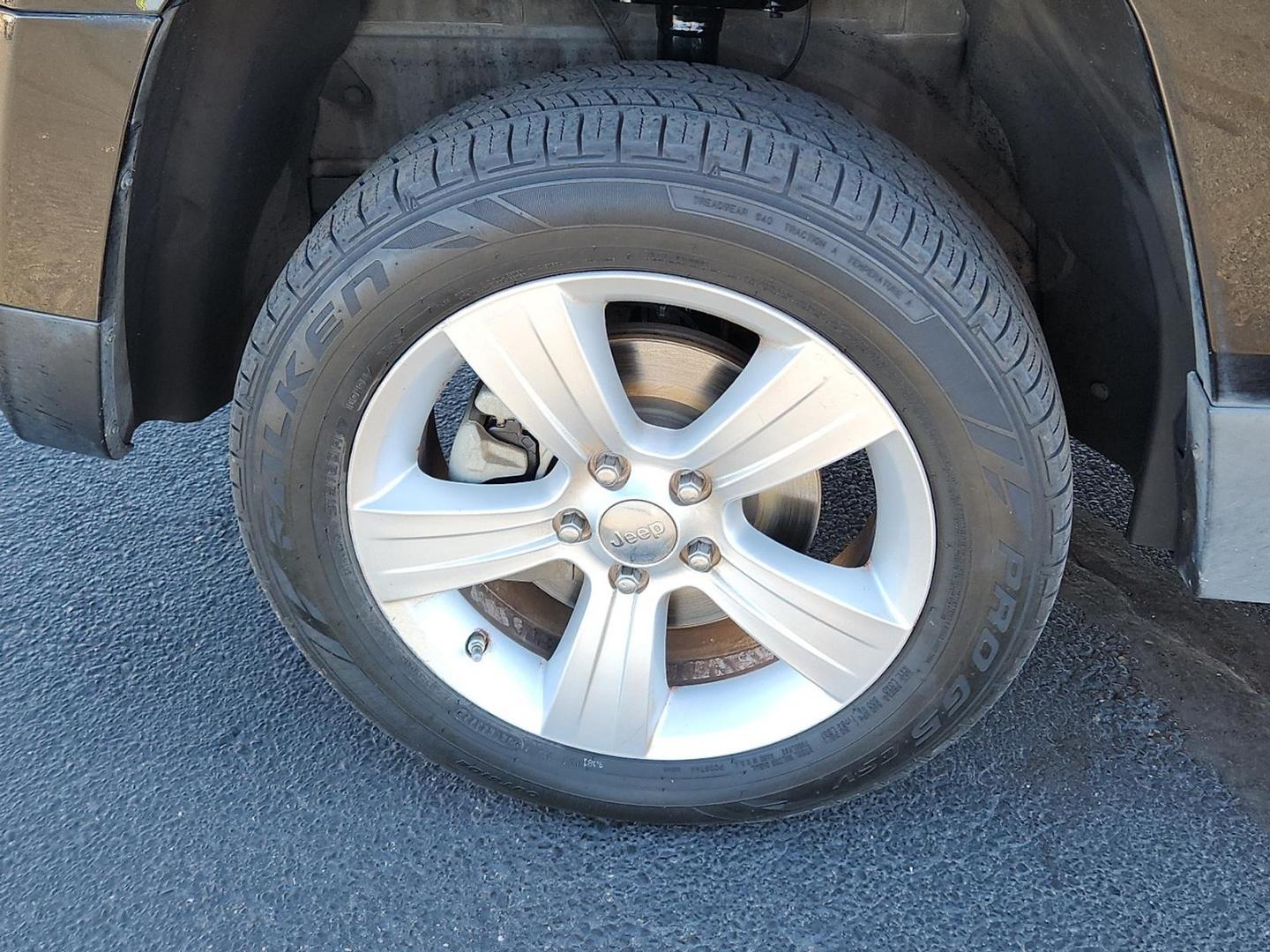 2012 BLACK Jeep Patriot Latitude (1C4NJPFB6CD) with an 2.4L I-4 DOHC, variable valve control, regular unleaded, engine with 172HP engine, located at 4711 Ave Q, Lubbock, TX, 79412, (806) 687-2362, 33.551304, -101.855293 - Photo#7