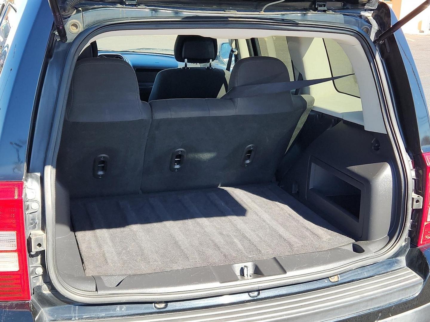 2012 BLACK Jeep Patriot Latitude (1C4NJPFB6CD) with an 2.4L I-4 DOHC, variable valve control, regular unleaded, engine with 172HP engine, located at 4711 Ave Q, Lubbock, TX, 79412, (806) 687-2362, 33.551304, -101.855293 - Photo#9