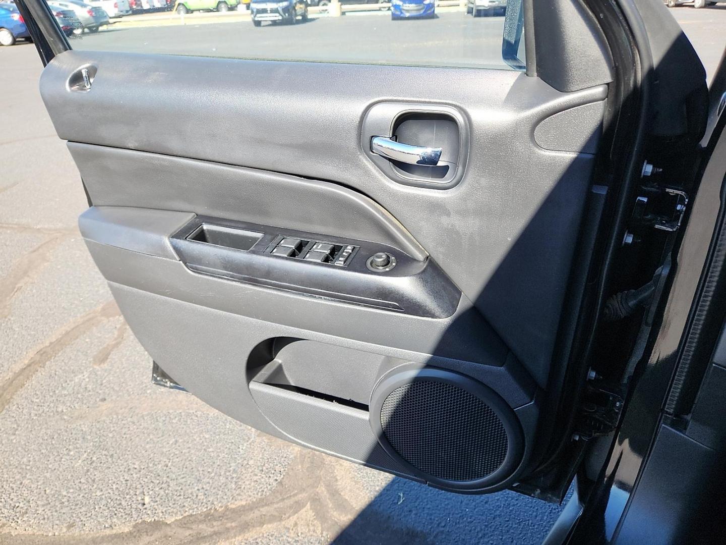 2012 BLACK Jeep Patriot Latitude (1C4NJPFB6CD) with an 2.4L I-4 DOHC, variable valve control, regular unleaded, engine with 172HP engine, located at 4711 Ave Q, Lubbock, TX, 79412, (806) 687-2362, 33.551304, -101.855293 - Photo#16