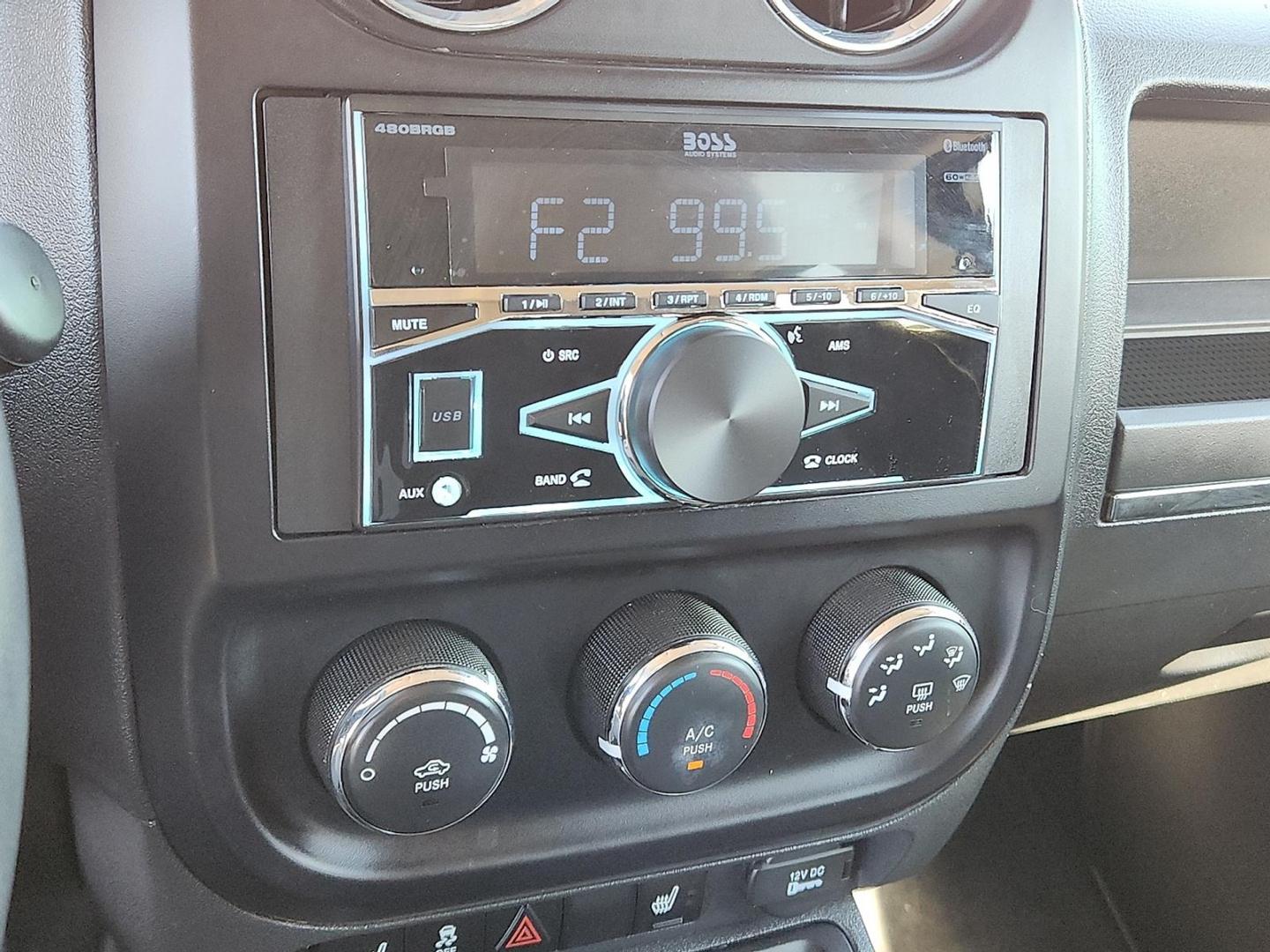 2012 BLACK Jeep Patriot Latitude (1C4NJPFB6CD) with an 2.4L I-4 DOHC, variable valve control, regular unleaded, engine with 172HP engine, located at 4711 Ave Q, Lubbock, TX, 79412, (806) 687-2362, 33.551304, -101.855293 - Photo#18