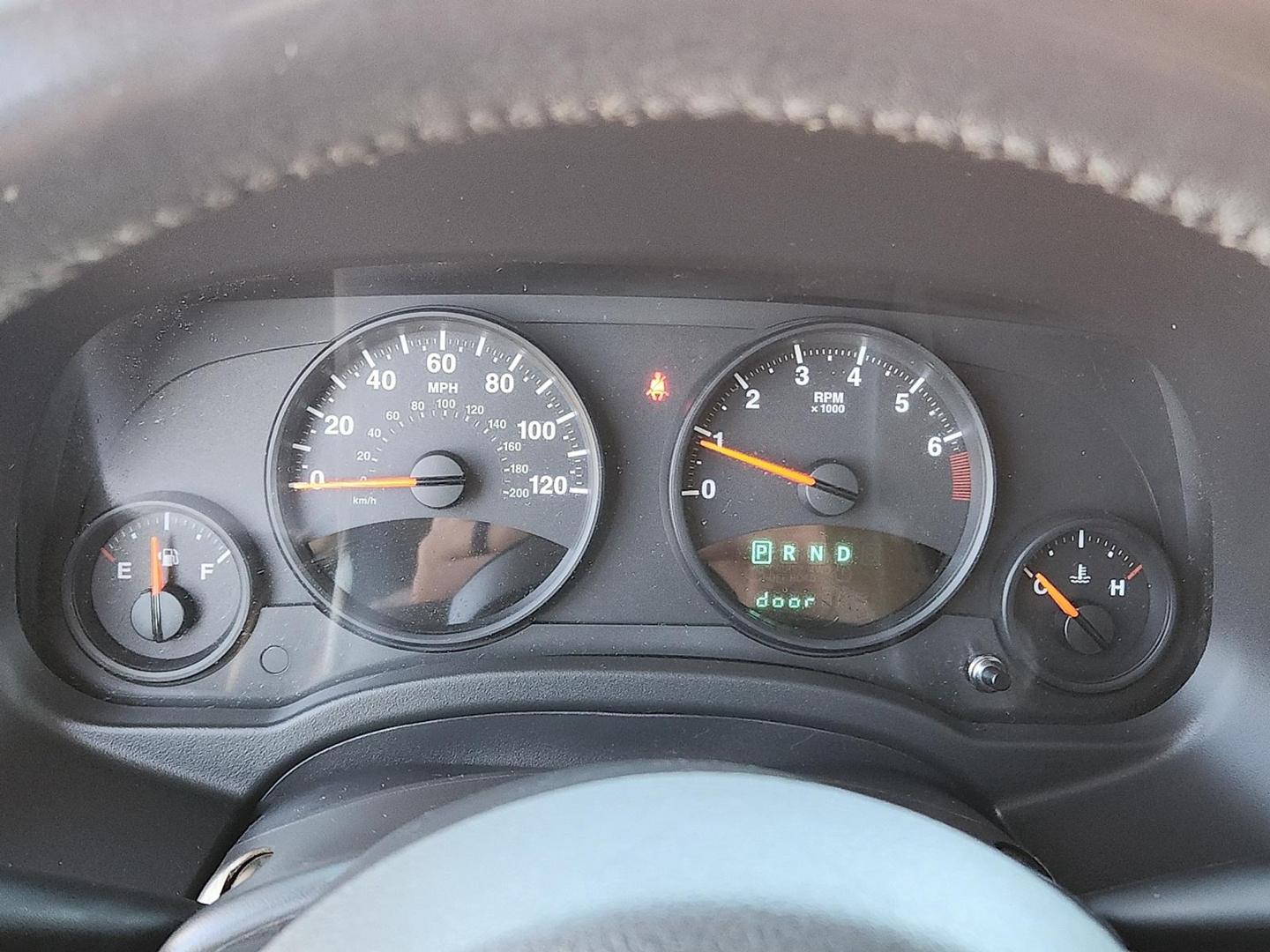 2012 BLACK Jeep Patriot Latitude (1C4NJPFB6CD) with an 2.4L I-4 DOHC, variable valve control, regular unleaded, engine with 172HP engine, located at 4711 Ave Q, Lubbock, TX, 79412, (806) 687-2362, 33.551304, -101.855293 - Photo#20