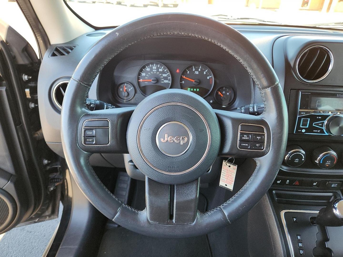 2012 BLACK Jeep Patriot Latitude (1C4NJPFB6CD) with an 2.4L I-4 DOHC, variable valve control, regular unleaded, engine with 172HP engine, located at 4711 Ave Q, Lubbock, TX, 79412, (806) 687-2362, 33.551304, -101.855293 - Photo#23