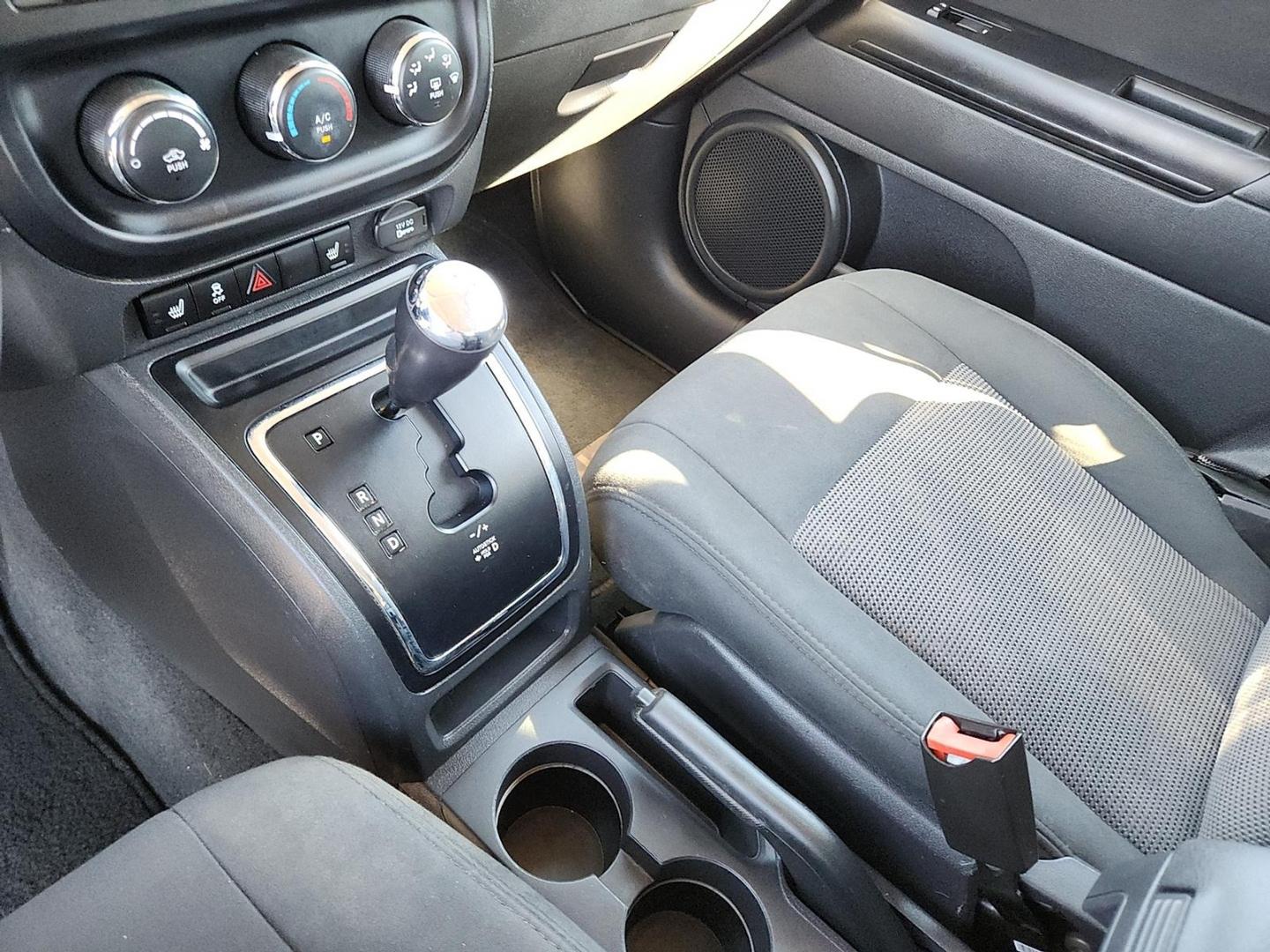 2012 BLACK Jeep Patriot Latitude (1C4NJPFB6CD) with an 2.4L I-4 DOHC, variable valve control, regular unleaded, engine with 172HP engine, located at 4711 Ave Q, Lubbock, TX, 79412, (806) 687-2362, 33.551304, -101.855293 - Photo#24