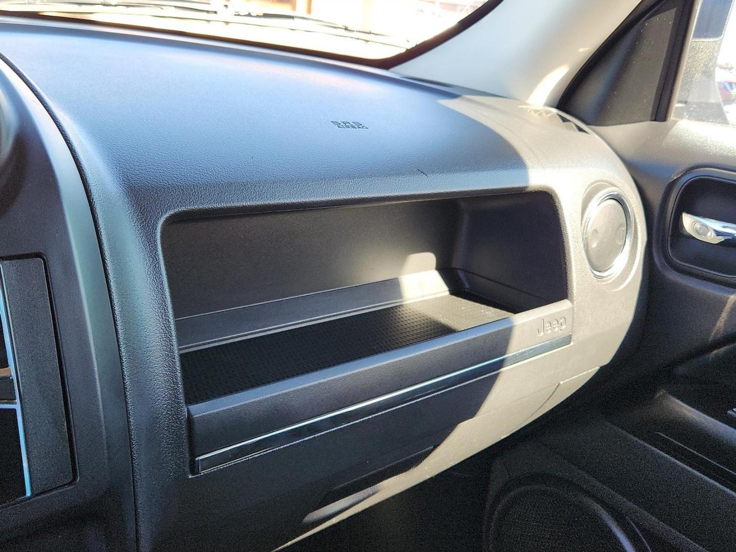 2012 BLACK Jeep Patriot Latitude (1C4NJPFB6CD) with an 2.4L I-4 DOHC, variable valve control, regular unleaded, engine with 172HP engine, located at 4711 Ave Q, Lubbock, TX, 79412, (806) 687-2362, 33.551304, -101.855293 - Photo#27