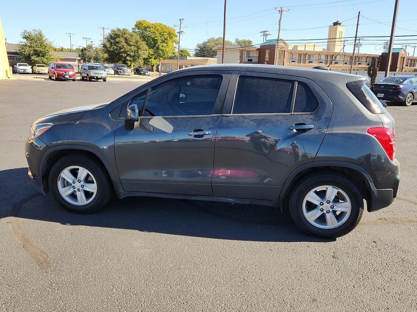 2019 GRAY Chevrolet Trax LS (3GNCJKSBXKL) with an Ecotec 1.4L I-4 DOHC, variable valve control, intercooled turbo, regular unleaded, engine with 138HP engine, located at 4711 Ave Q, Lubbock, TX, 79412, (806) 687-2362, 33.551304, -101.855293 - Photo#1