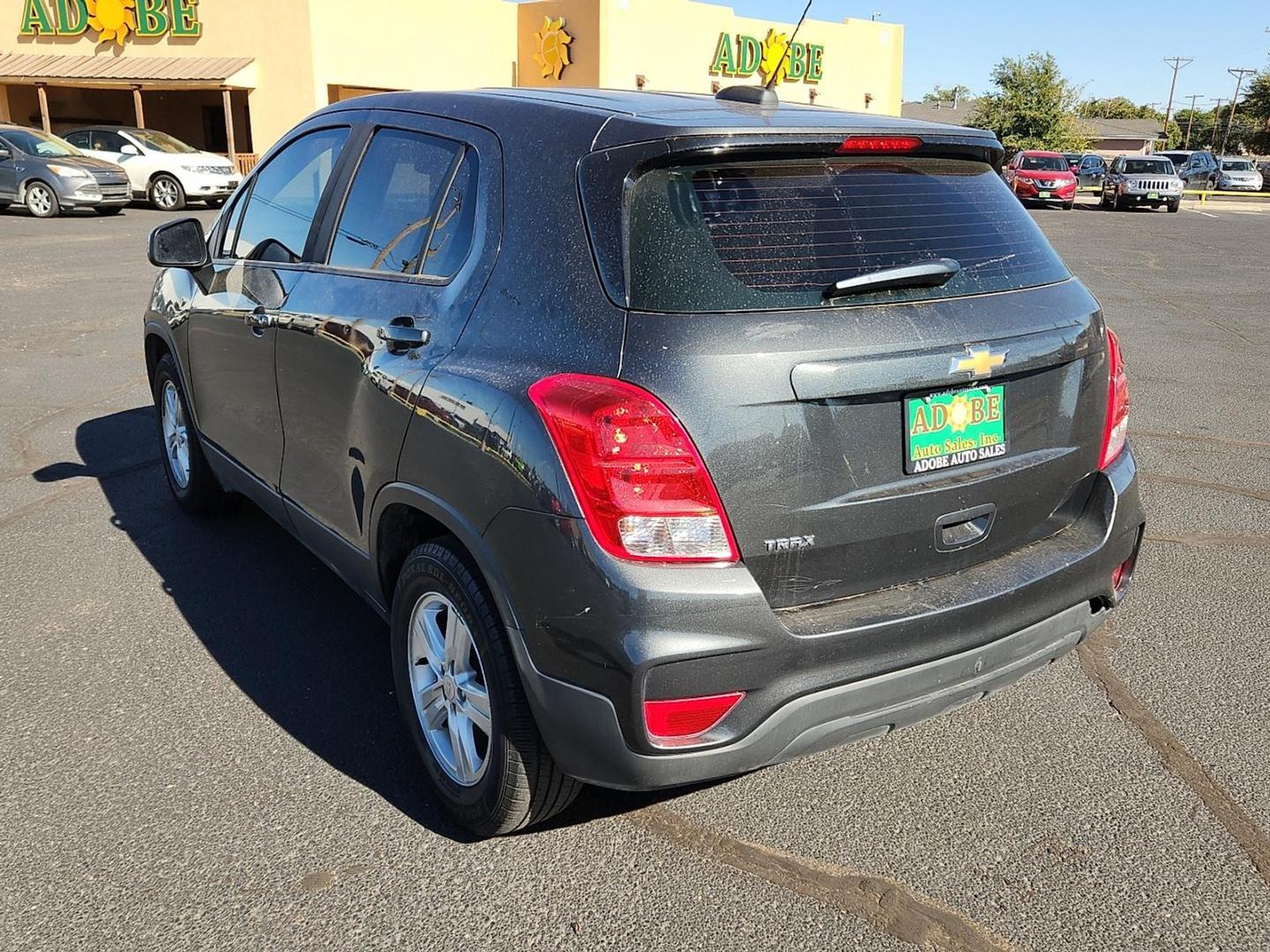 2019 GRAY Chevrolet Trax LS (3GNCJKSBXKL) with an Ecotec 1.4L I-4 DOHC, variable valve control, intercooled turbo, regular unleaded, engine with 138HP engine, located at 4711 Ave Q, Lubbock, TX, 79412, (806) 687-2362, 33.551304, -101.855293 - Photo#2