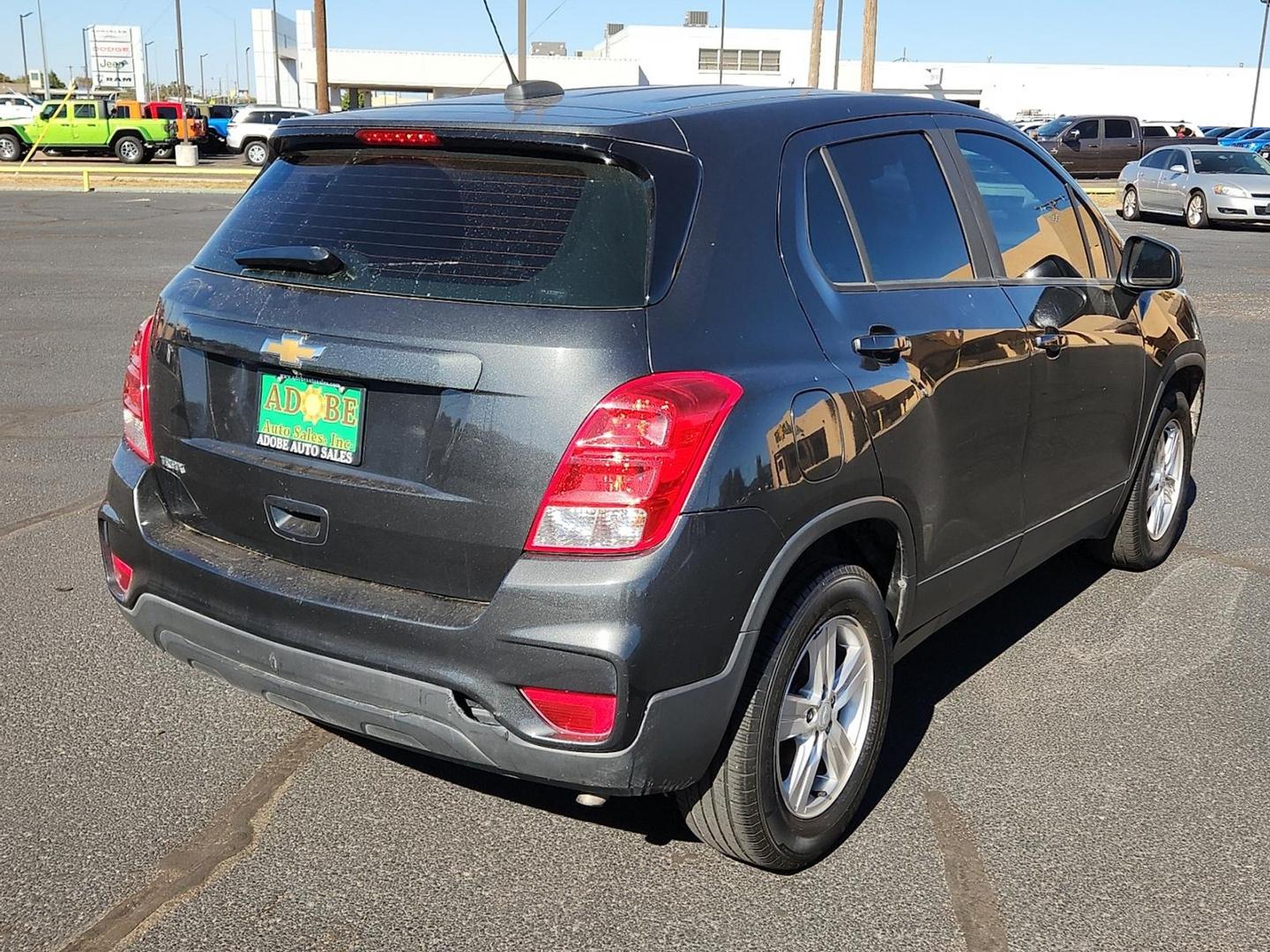 2019 GRAY Chevrolet Trax LS (3GNCJKSBXKL) with an Ecotec 1.4L I-4 DOHC, variable valve control, intercooled turbo, regular unleaded, engine with 138HP engine, located at 4711 Ave Q, Lubbock, TX, 79412, (806) 687-2362, 33.551304, -101.855293 - Photo#3