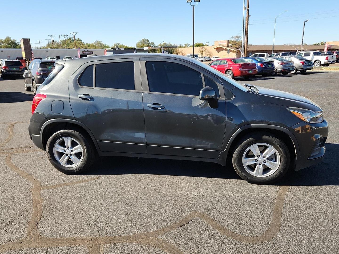 2019 GRAY Chevrolet Trax LS (3GNCJKSBXKL) with an Ecotec 1.4L I-4 DOHC, variable valve control, intercooled turbo, regular unleaded, engine with 138HP engine, located at 4711 Ave Q, Lubbock, TX, 79412, (806) 687-2362, 33.551304, -101.855293 - Photo#4